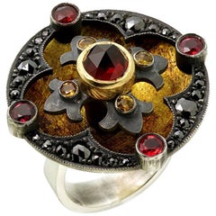 Rouge Disc Ring 18 Karat Gold Sterling Silver Diamonds Sapphires Garnets