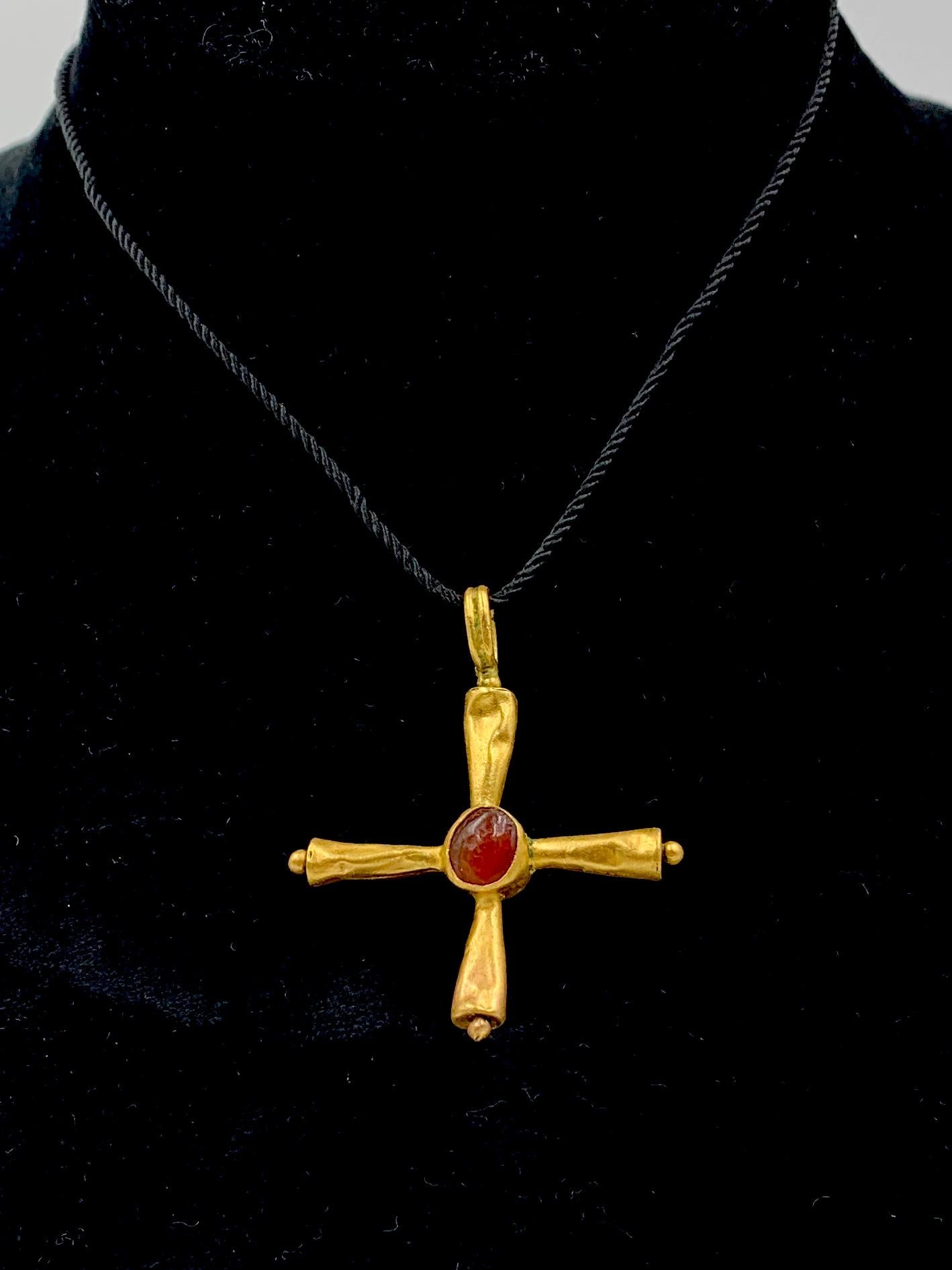 The shape and form of this rare cross is known as Thor's Cross or the Cross of Cuthbert, a Celtic Christian associated with the Kingdom of Northumbria and Southern Scotland. After his death, Cuthbert became the most revered saint of Northern