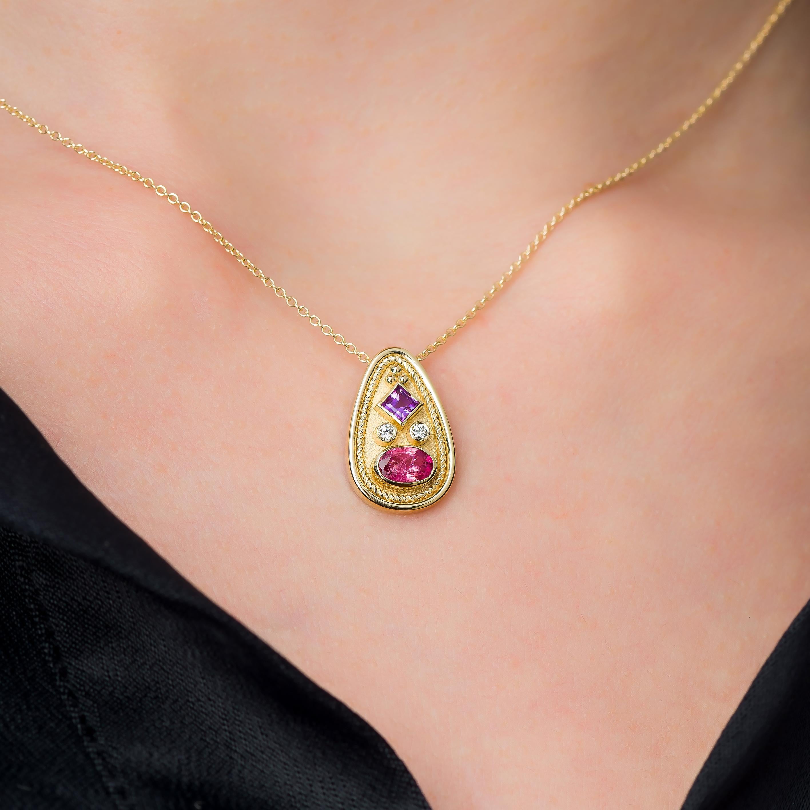 Discover the exquisite charm of our rounded pear-shaped gold pendant, adorned with a square amethyst and an oval pink tourmaline, a harmonious blend of gemstones and design that exudes timeless elegance.

100% handmade in our workshop.

Metal: 18K