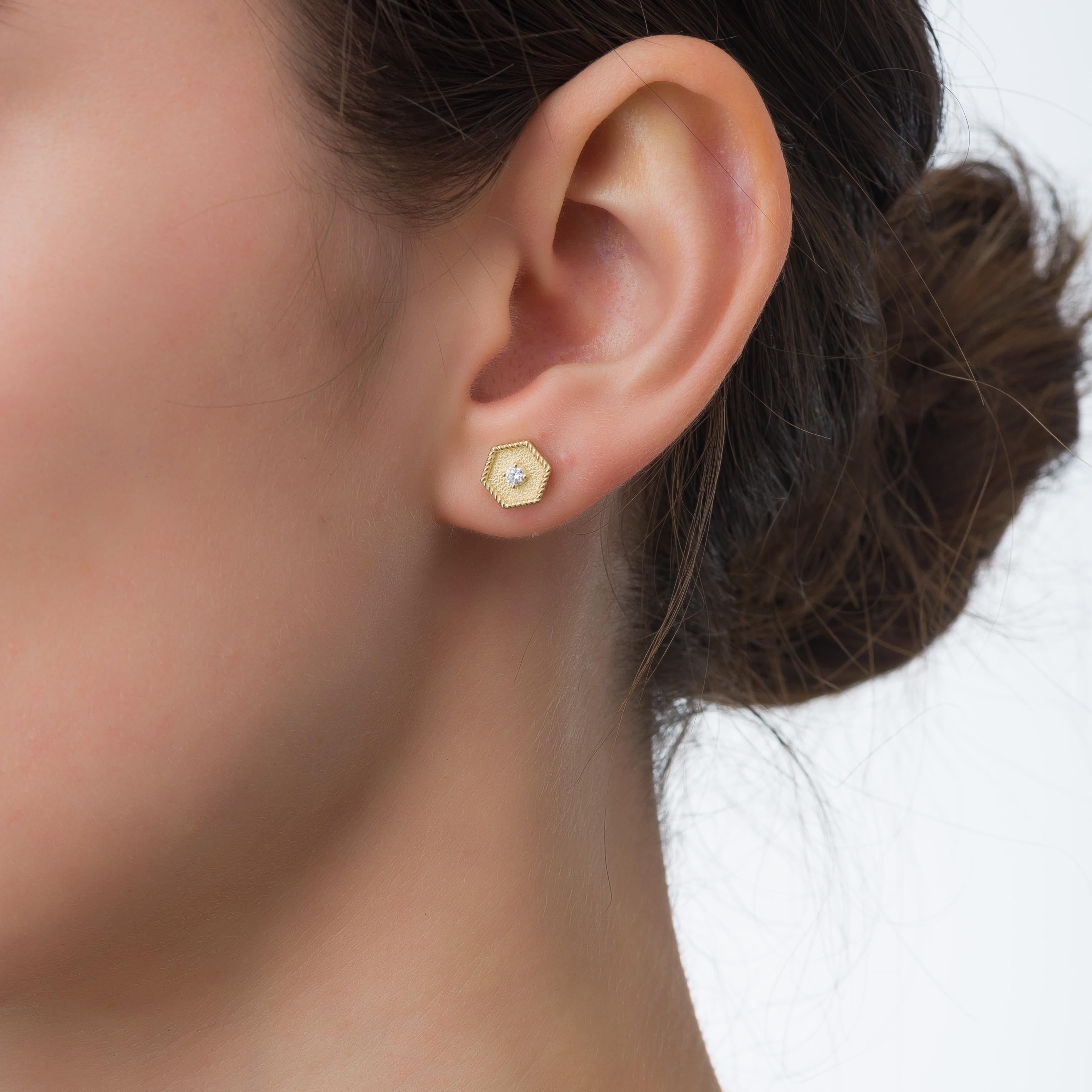 Immerse yourself in the modern sophistication of our captivating gold polygon-shaped earrings, where glistening diamonds light up each facet—a testament to timeless allure and contemporary elegance.

100% handmade in our workshop.

Metal: 18K