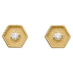 Boucles d'oreilles polygonales en or byzantin avec diamants