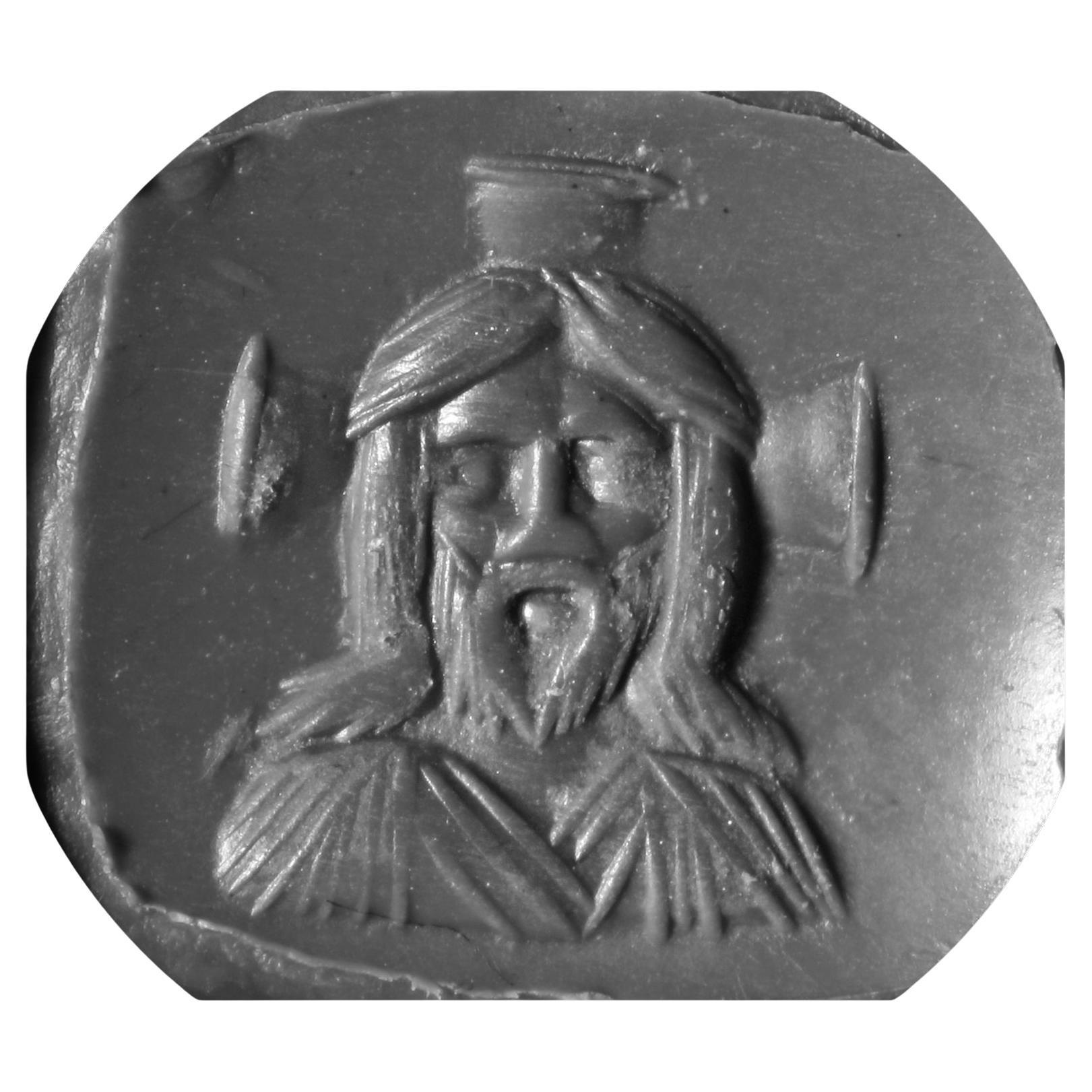 Uncut Byzantine Gold Ring With A Topaz Intaglio With A Bust Of Christ 7th Century For Sale