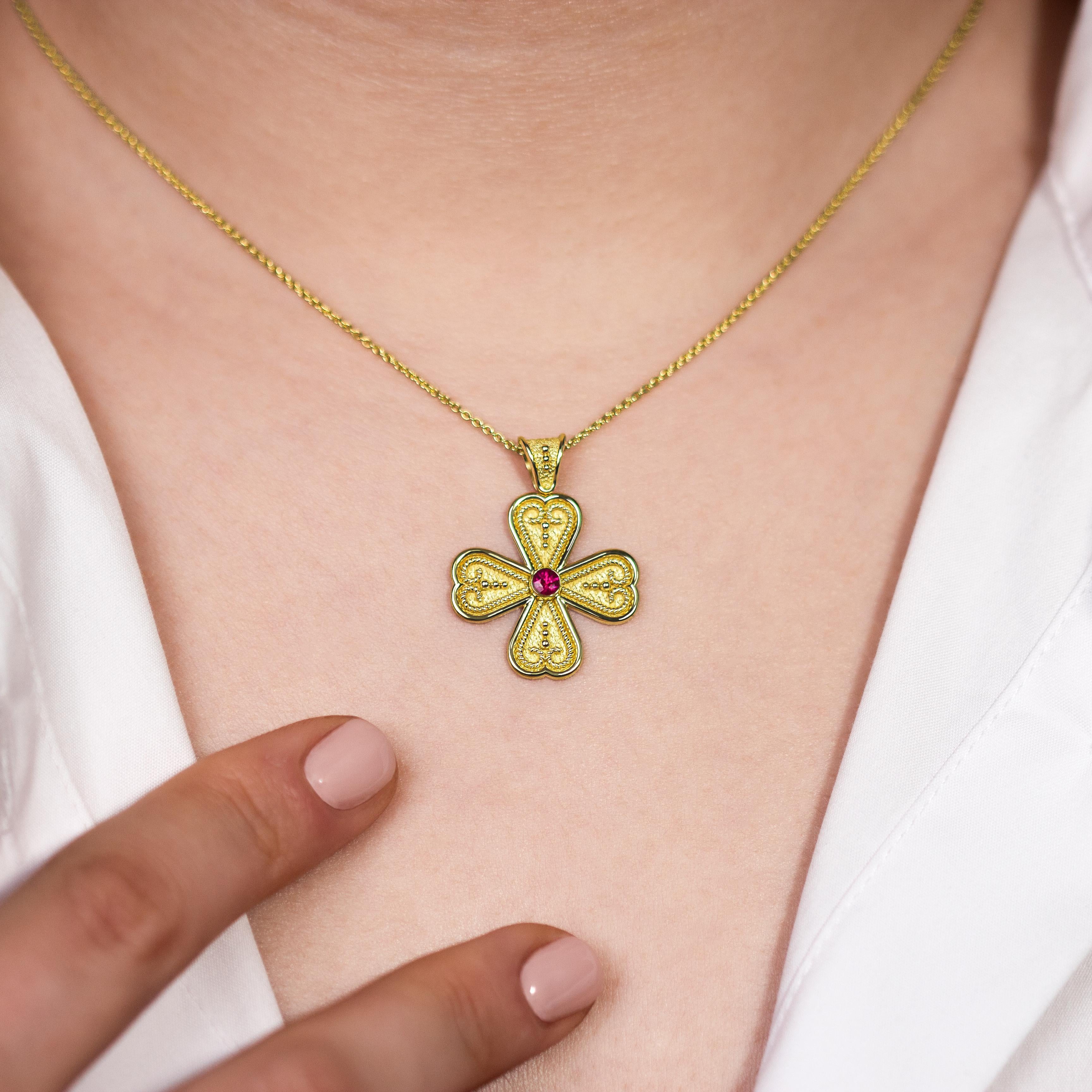Adorn yourself with a heart cross pendant, graced by a resplendent ruby at its core and adorned with delicate golden details—an embodiment of love and elegance in every facet.

100% handmade in our workshop.

Metal: 18K Gold
Gemstones: Ruby  weight
