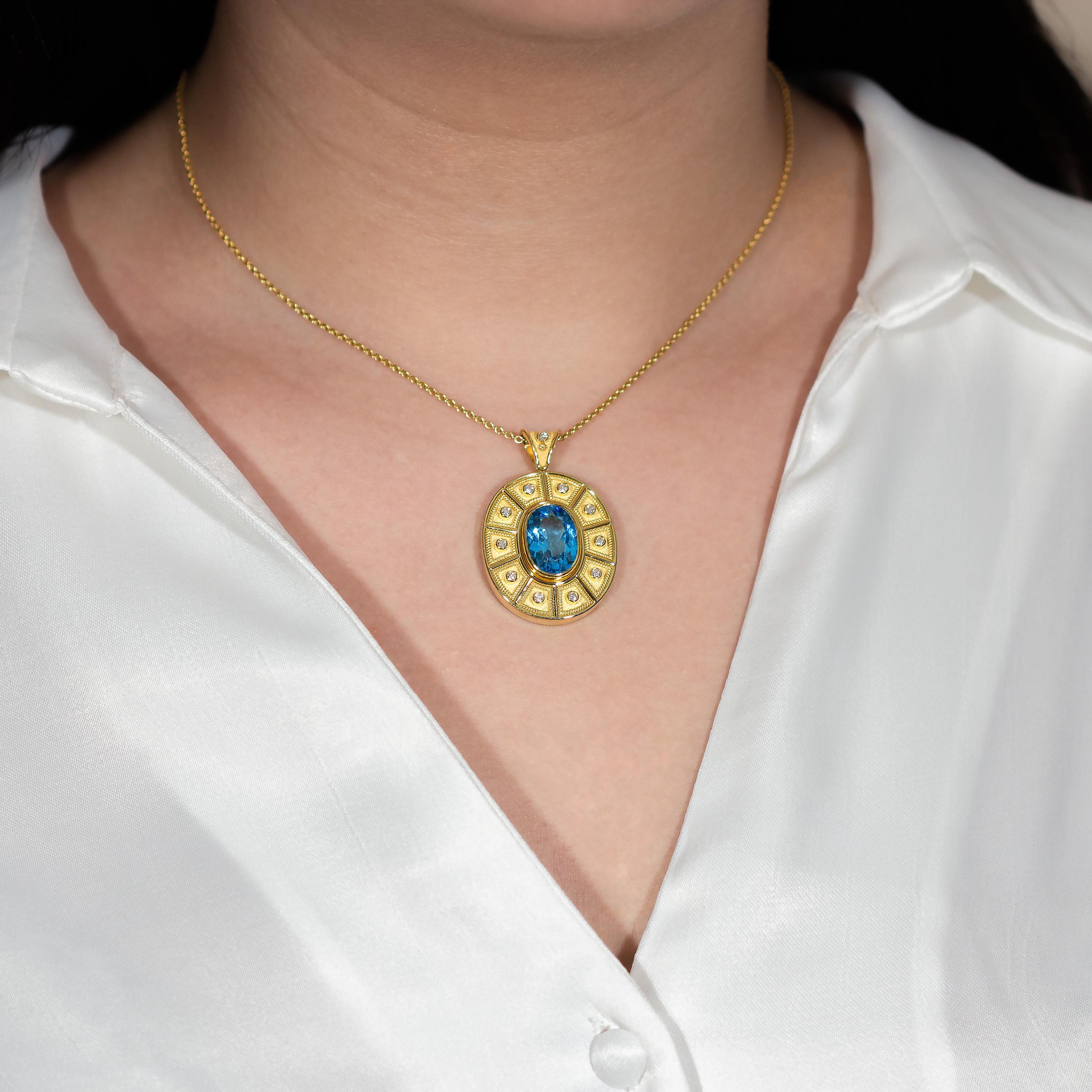 Adorn yourself with our grand oval gold pendant, intricately adorned with a stunning motif of trapezoids, each embraced by brilliant gemstones, culminating in a magnificent centerpiece, a resplendent Swiss topaz. A true testament to opulence and