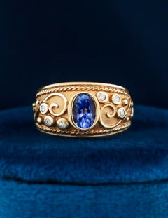 Byzantine Ring with Oval Tanzanite and Diamonds mounted in 14K Yellow Gold