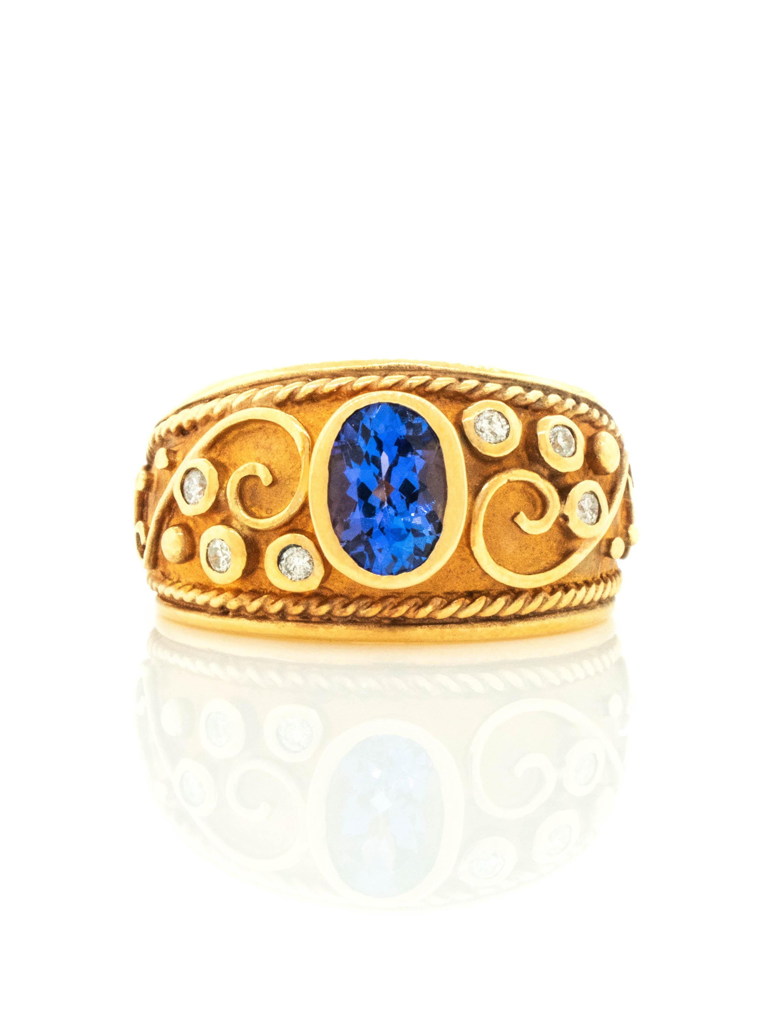 Anillo bizantino con tanzanita ovalada y diamantes montados en oro amarillo de 14 quilates Corte oval en venta