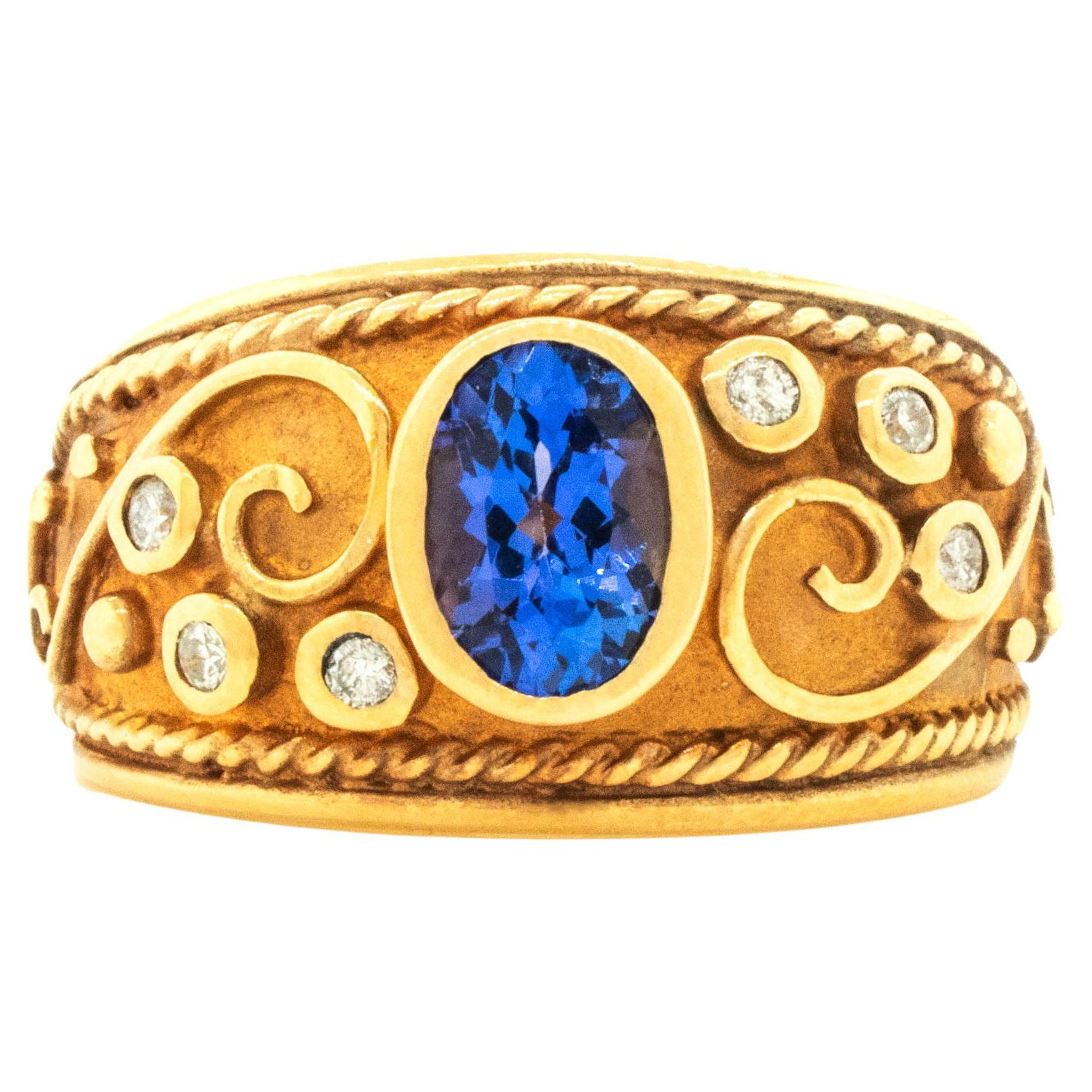 Anillo bizantino con tanzanita ovalada y diamantes montados en oro amarillo de 14 quilates en venta
