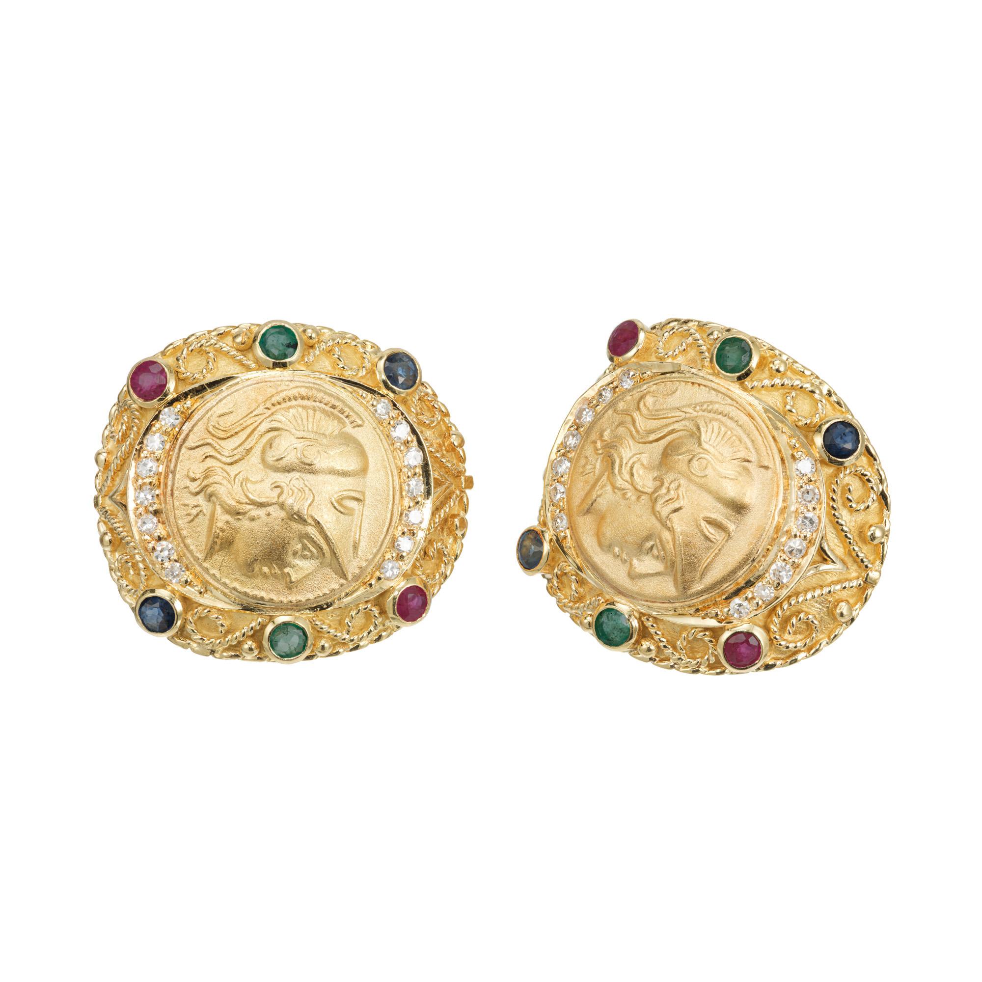 Vintage 1980's multi-stone lever back earrings. Both of these Byzantine style 18k yellow gold clip post earrings earrings consist 2 bezel set round rubies, 2 bezel set round emeralds and 2 bezel set round sapphires. Ornately detailed with both