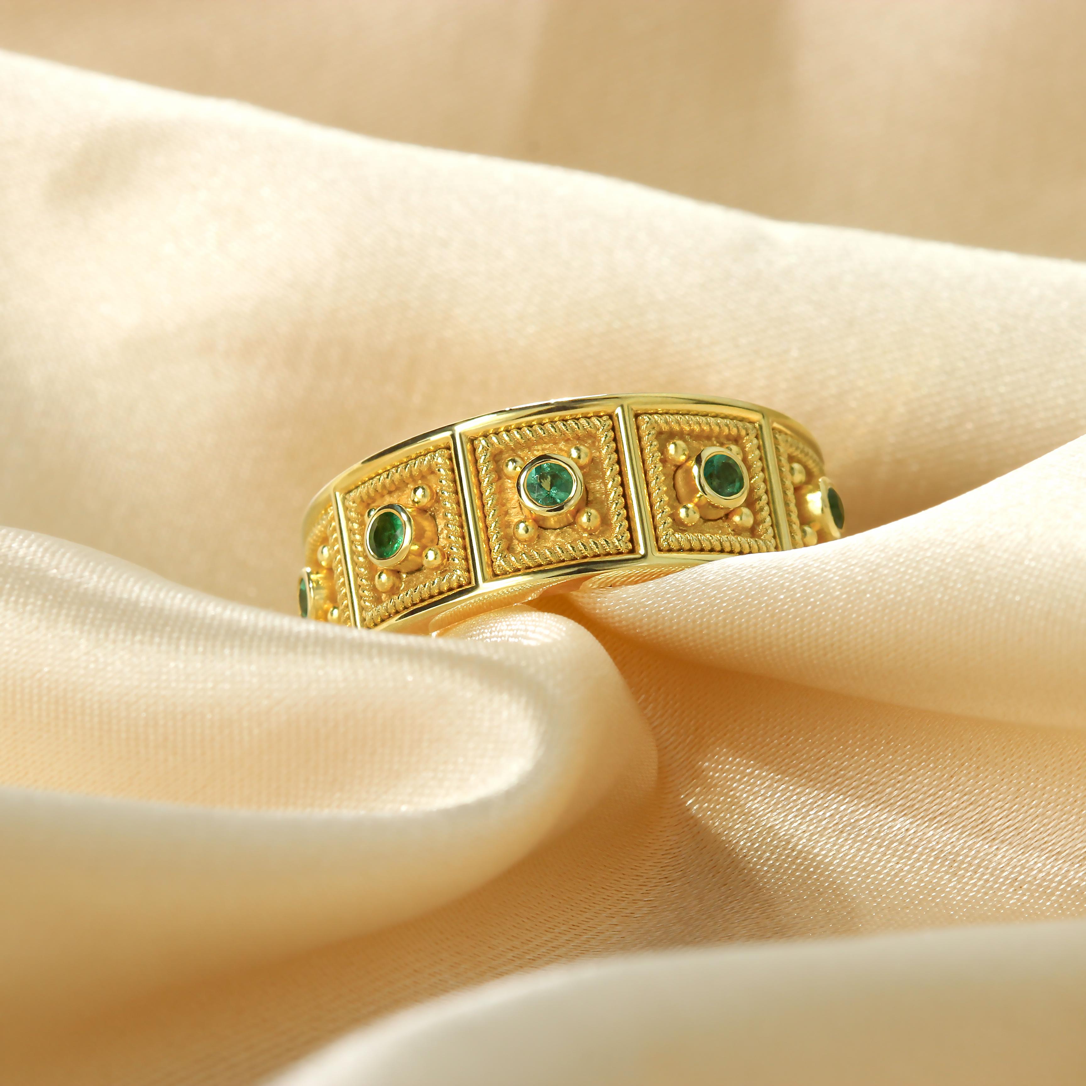 Step into the grandeur of Byzantine opulence with our captivating square gold ring adorned with radiant emeralds. Crafted meticulously in the style of Byzantine artistry, this band ring features a mesmerizing array of twisted gold squares, each