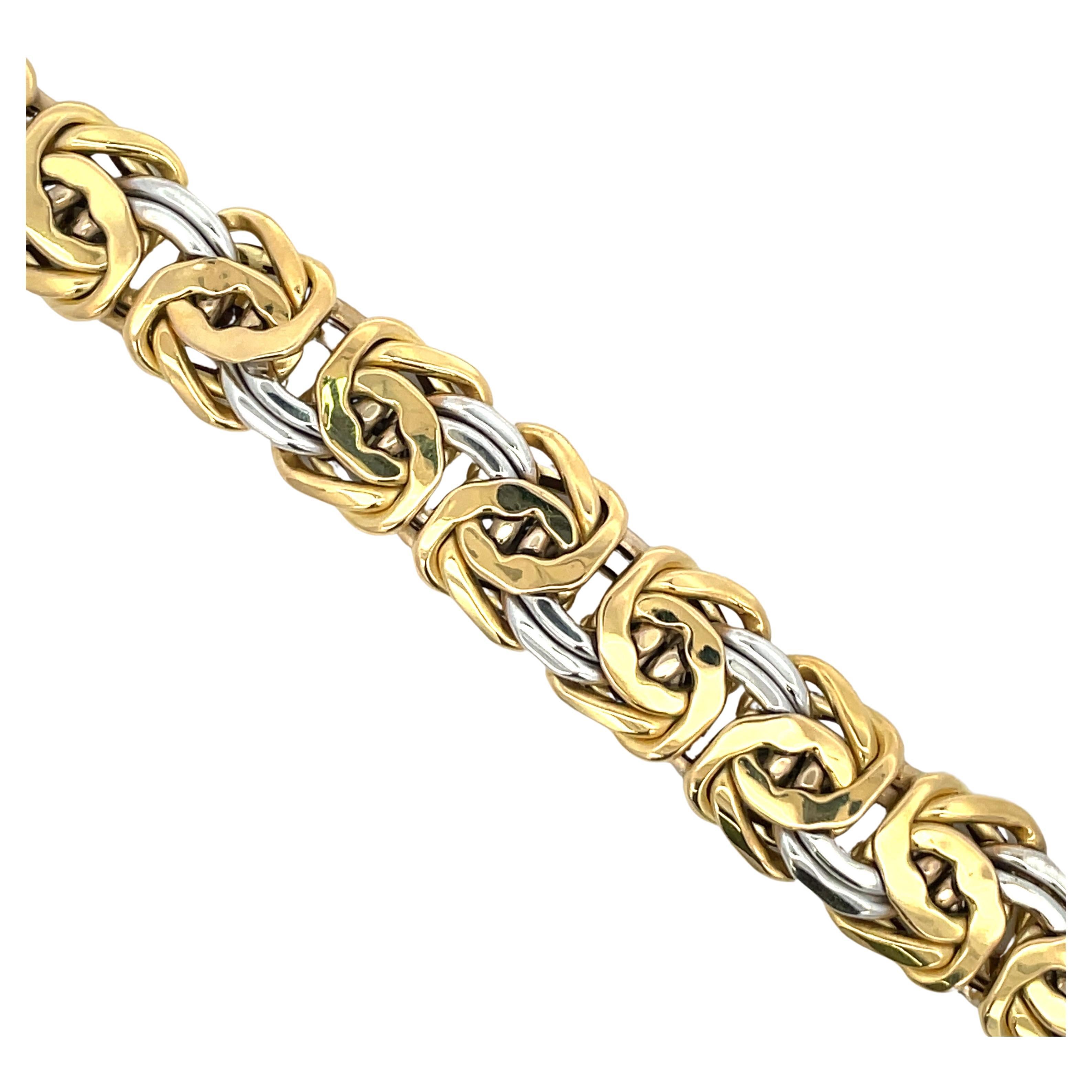 Byzantine style motif bracelet featuring two tone of 18 karat yellow and white gold weighing 31.9 Grams
Stamped 750 AR *389
More link bracelets available.
Search Harbor Diamonds

DM for more videos and pictures