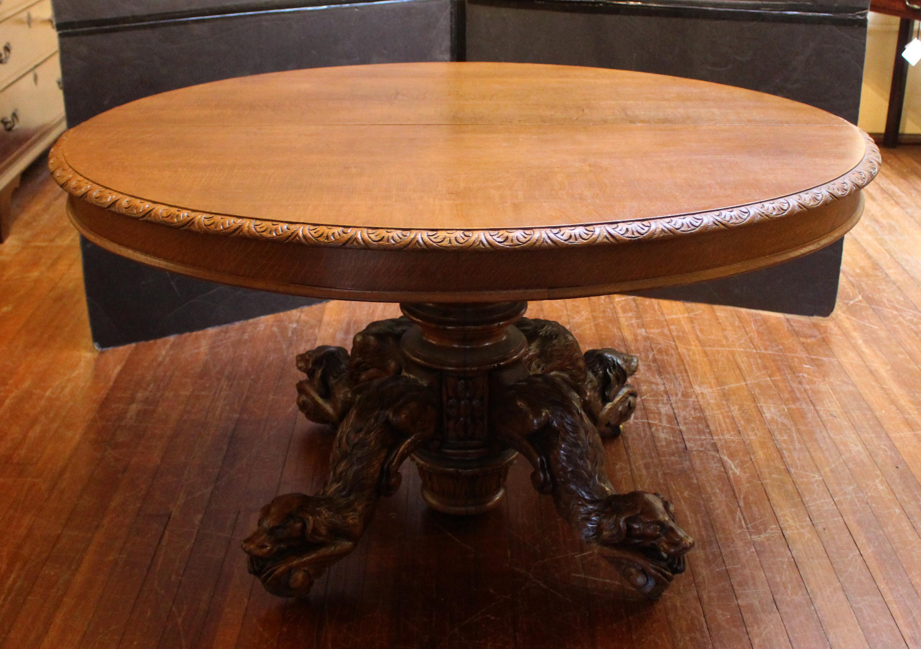 Circa 1880 French Hunting Chateau Table Carved with Long-haired Dachshunds. A superb example, ideal as a center table or small dining table, supported by 4 legs each well carved with long-haired Dachshunds - loved for dashing through tangled