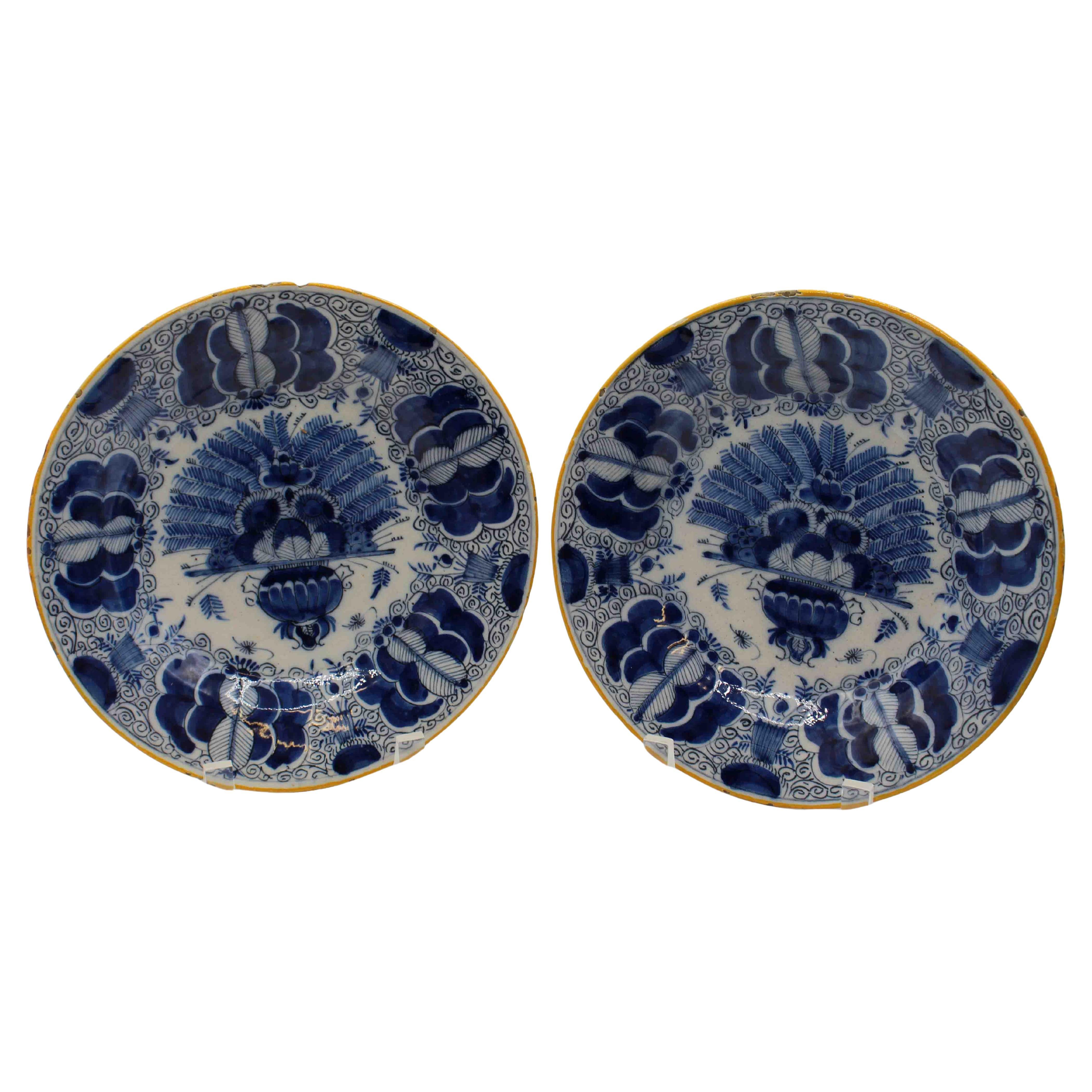 C. 1800 Pair of Delft Blue and White Peacock Feather Vase Plates