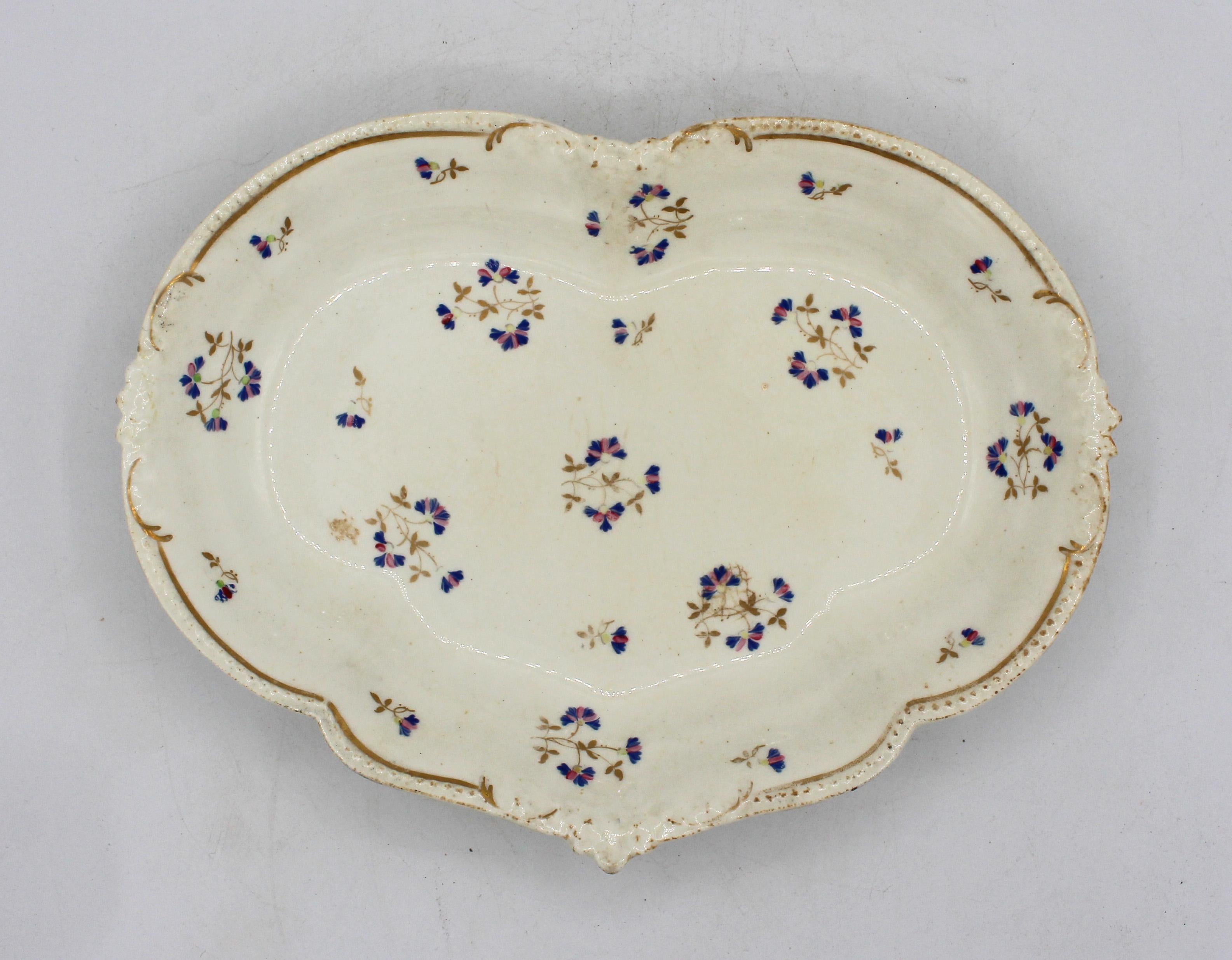 Circa 1820 Crown Derby sweetmeat dish, English. Heart lozenge form decorated with corn flowers with gilt highlights (some expected wear & minor rough area left edge).
10.5
