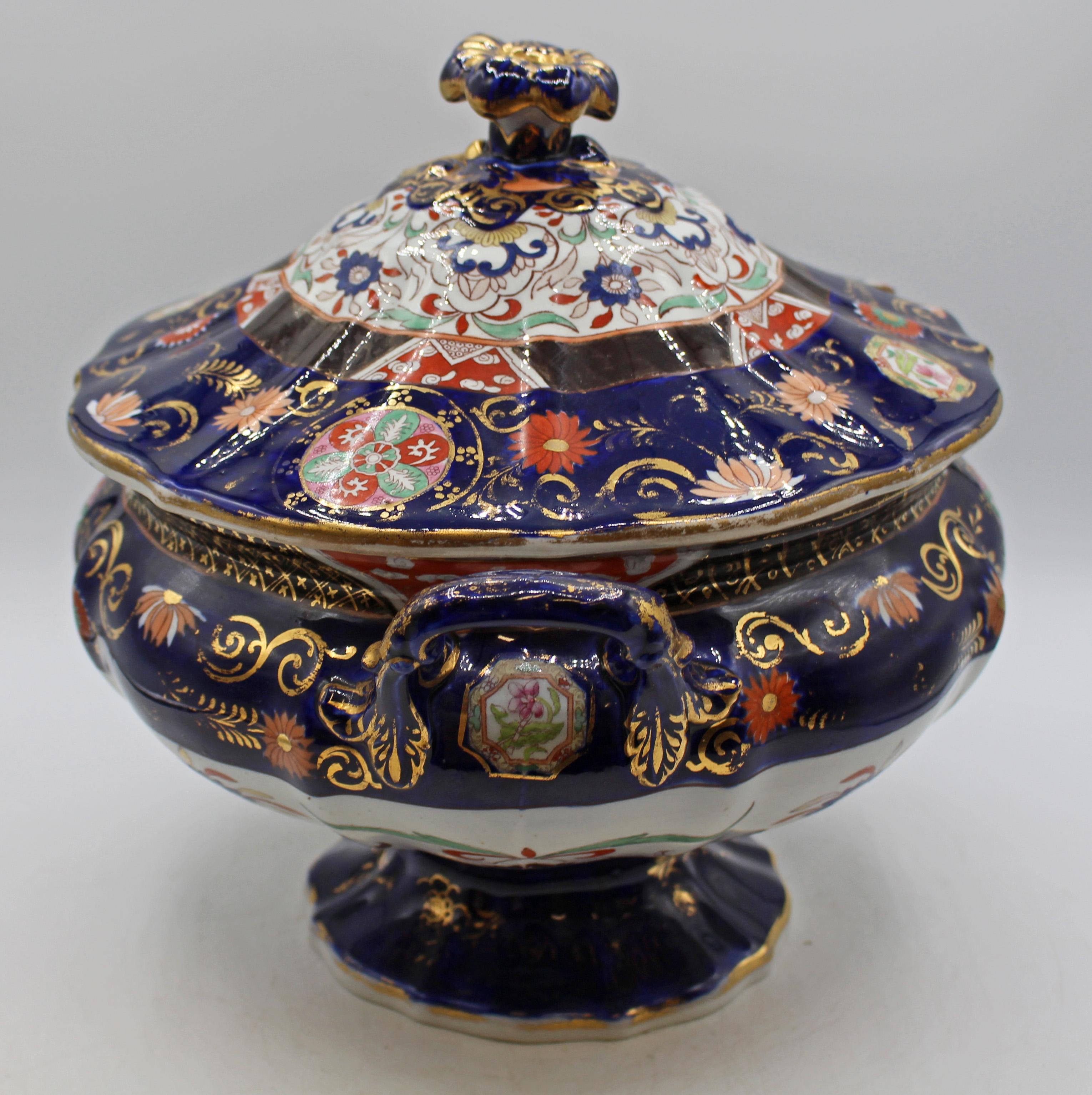 Circa 1830-50 Mason's Patent Ironstone China Covered Soup Tureen. Handsomely decorated with floral within geometric reserves, heavily influenced by Japan patterns of the era. Wear commensurate with age 
use. Lacks undertray. Previous owner's