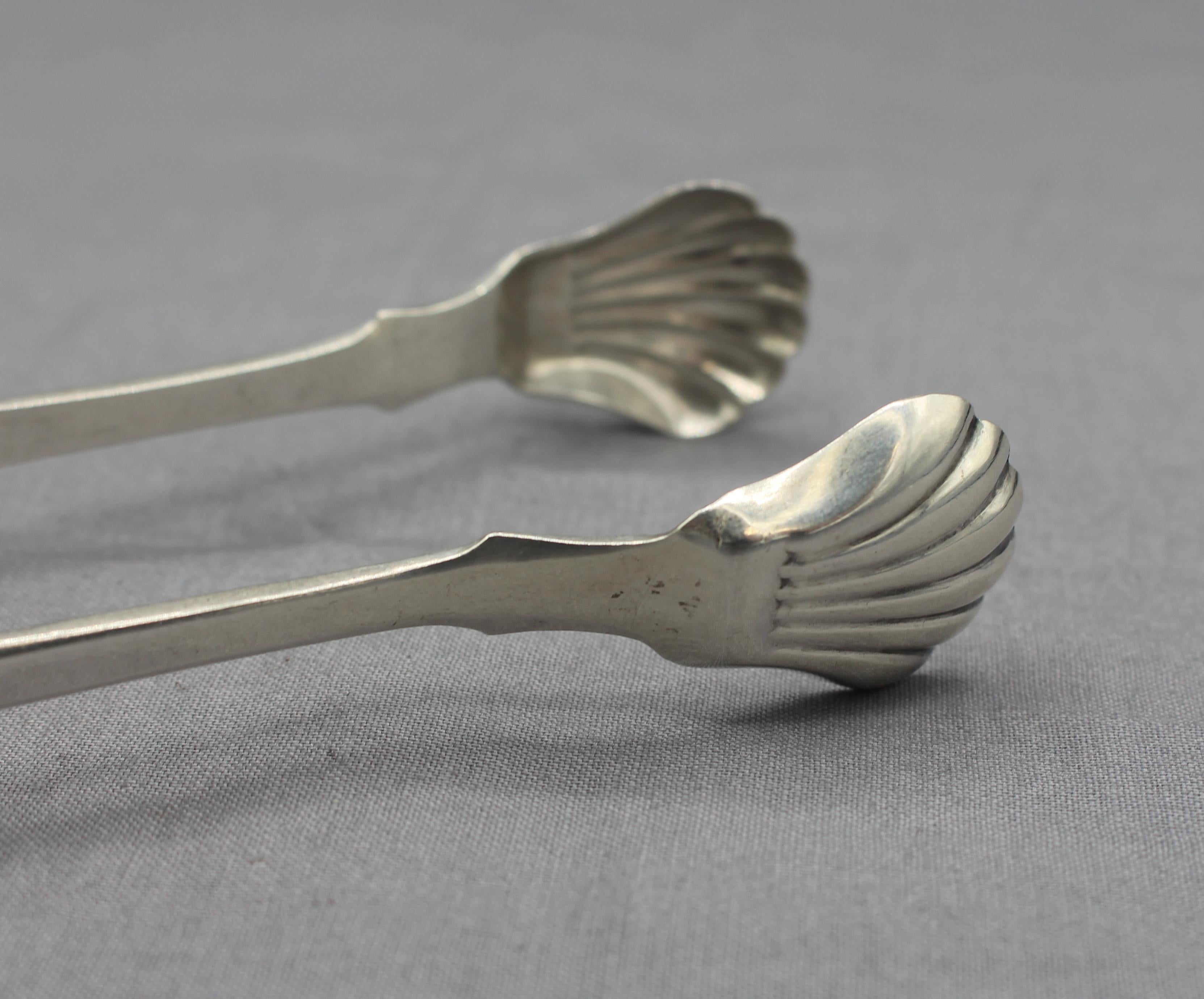 Coin silver sugar tongs by Robert & William Wilson, Philadelphia, c.1830s. Wonderful design - thistle engraved, shell end. No doubt for a client of Scottish ancestry! Monogram: MAB. 1.30 troy oz.
6.5