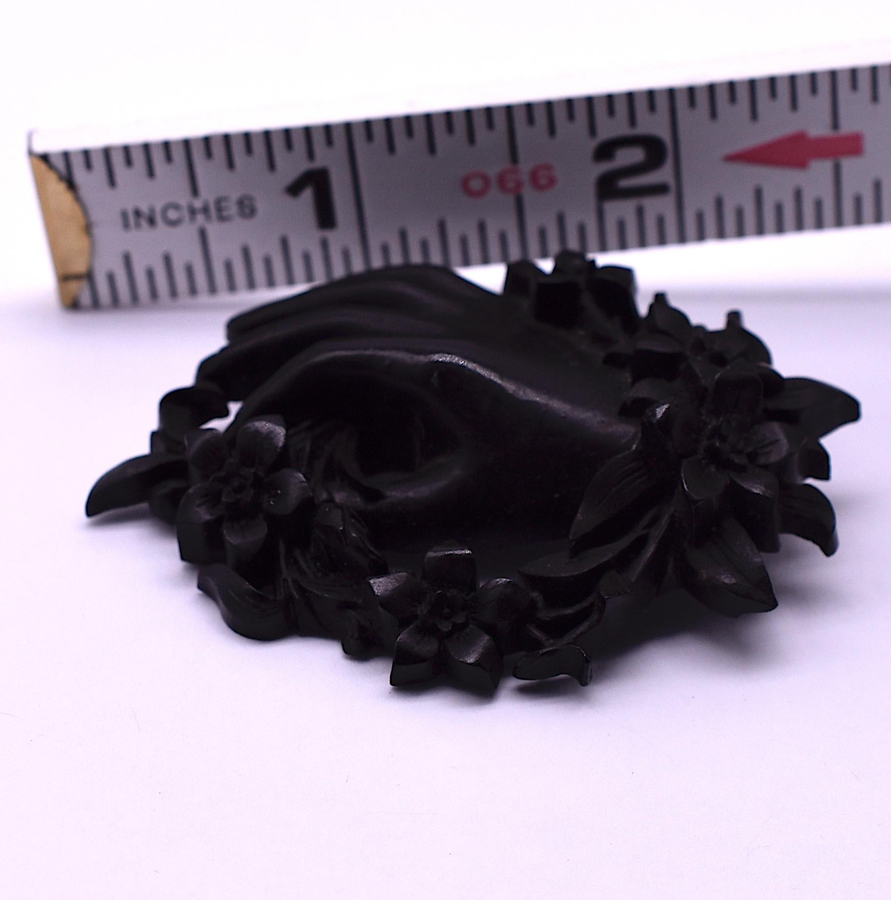 Victorian C. 1850 Carved Bog Oak Brooch Depicting a Wreath of Flowers and a Hand 