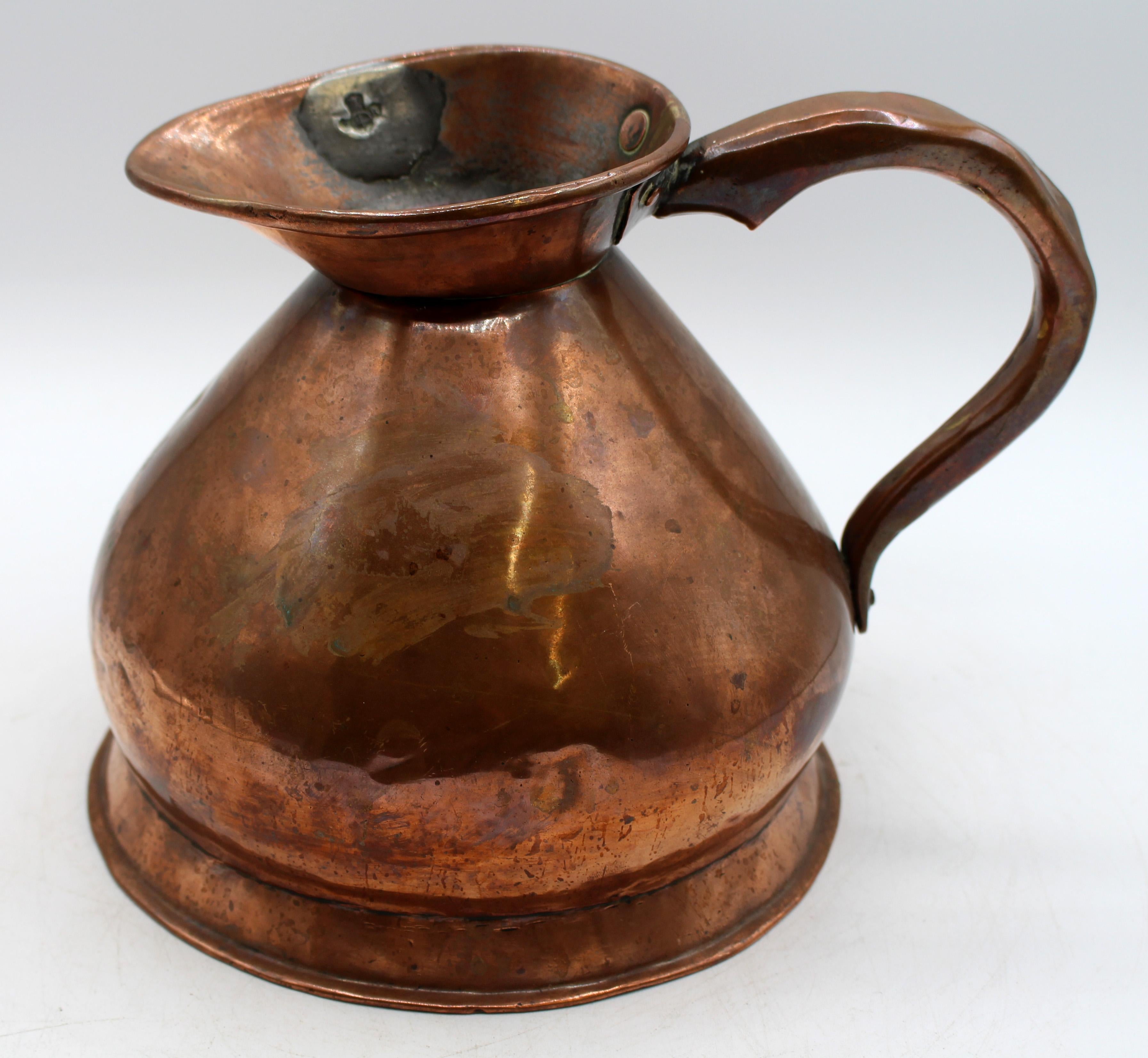 Circa 1860 1/2 gallon copper haystack measure, English. Victorian marks for accuracy. Dovetail construction. Indentations to handle & minor dings to body as expected with age & use.
9