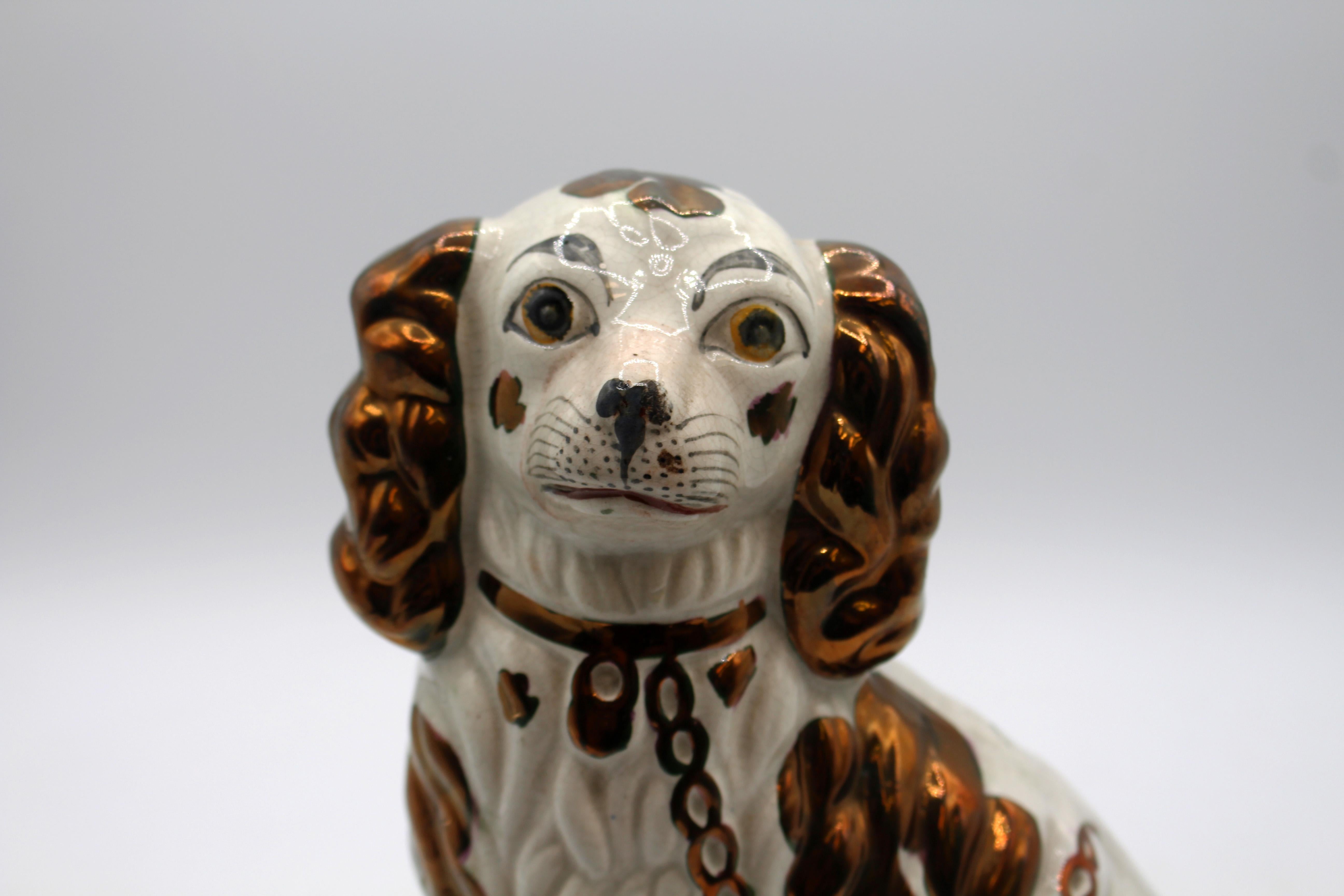 Circa 1860s-70s copper luster Staffordshire King Charles Spaniel, English. Well modelled. Copper luster in good condition - nice details with the collar & chain, etc. 
6.25