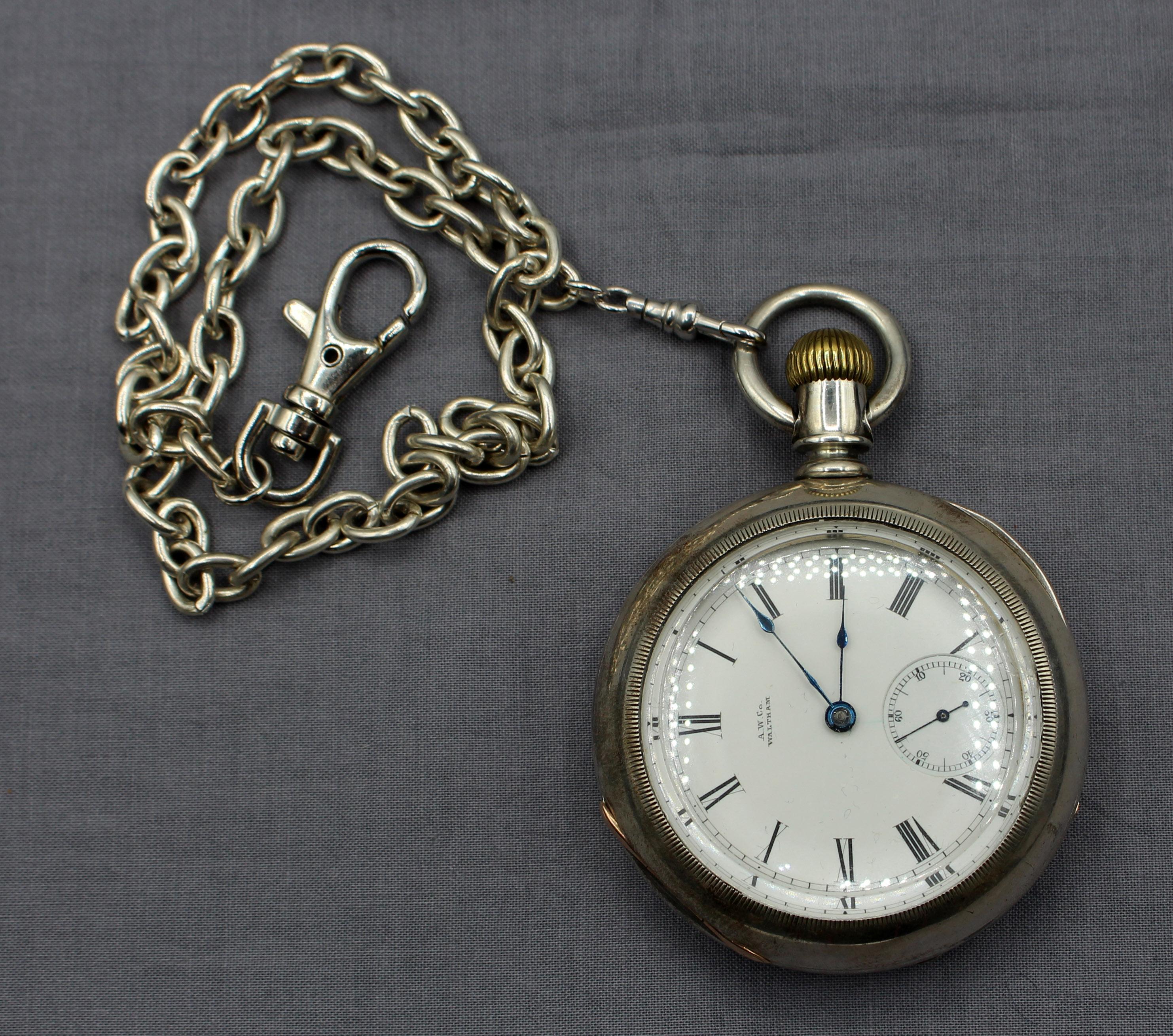 American Watch Co large open face coin silver pocket watch, circa 1886. Oversized movement & second hand. American Watch Co, P.S. Bartlett, Waltham, Mass #2969576. 60mm dia. case by Leader (Keystone Watch Case Co). With later plated chain. Known as
