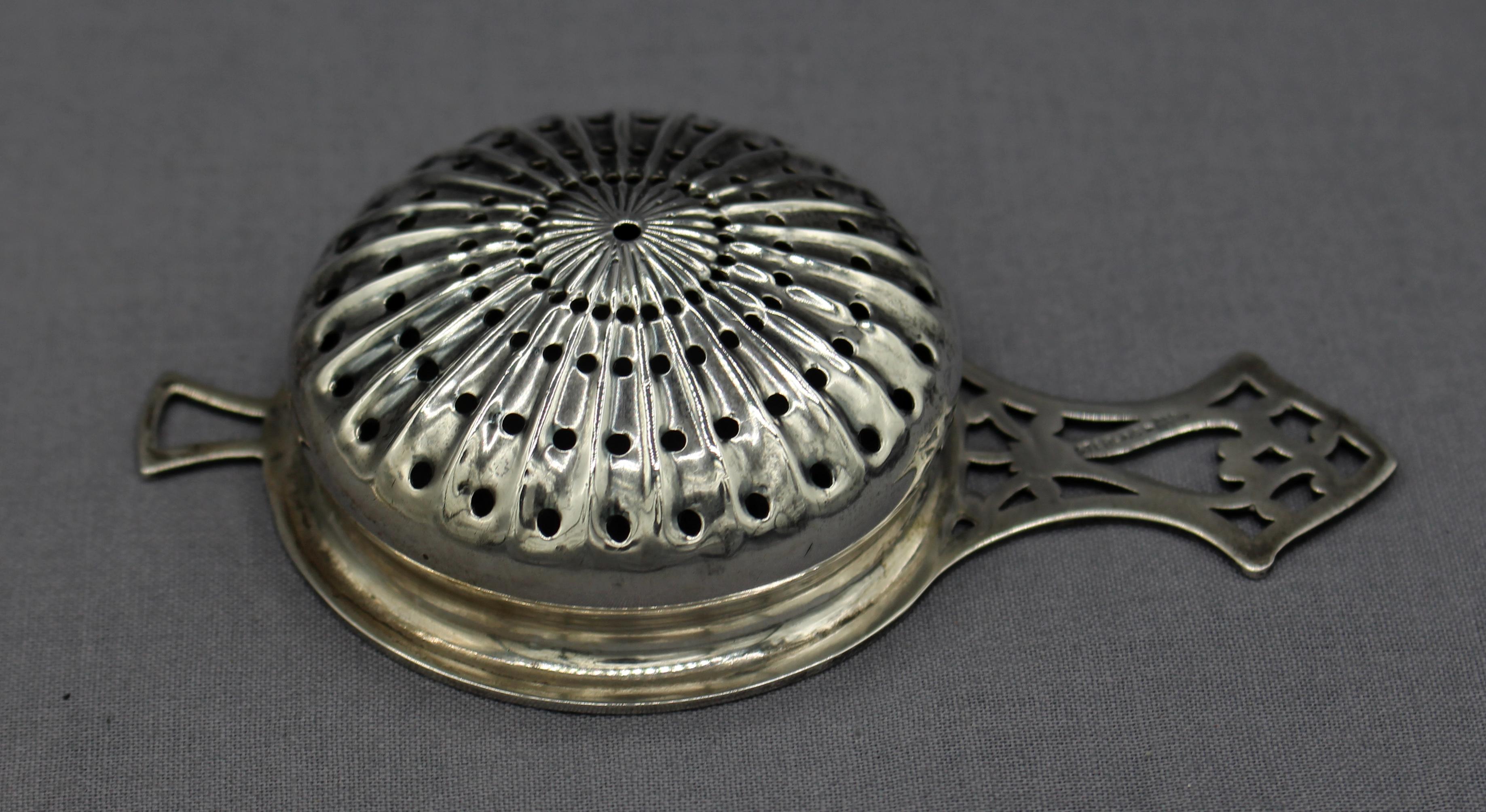 Victorian c. 1890-1920 Sterling Tea Strainer with Silver Plated Stand For Sale