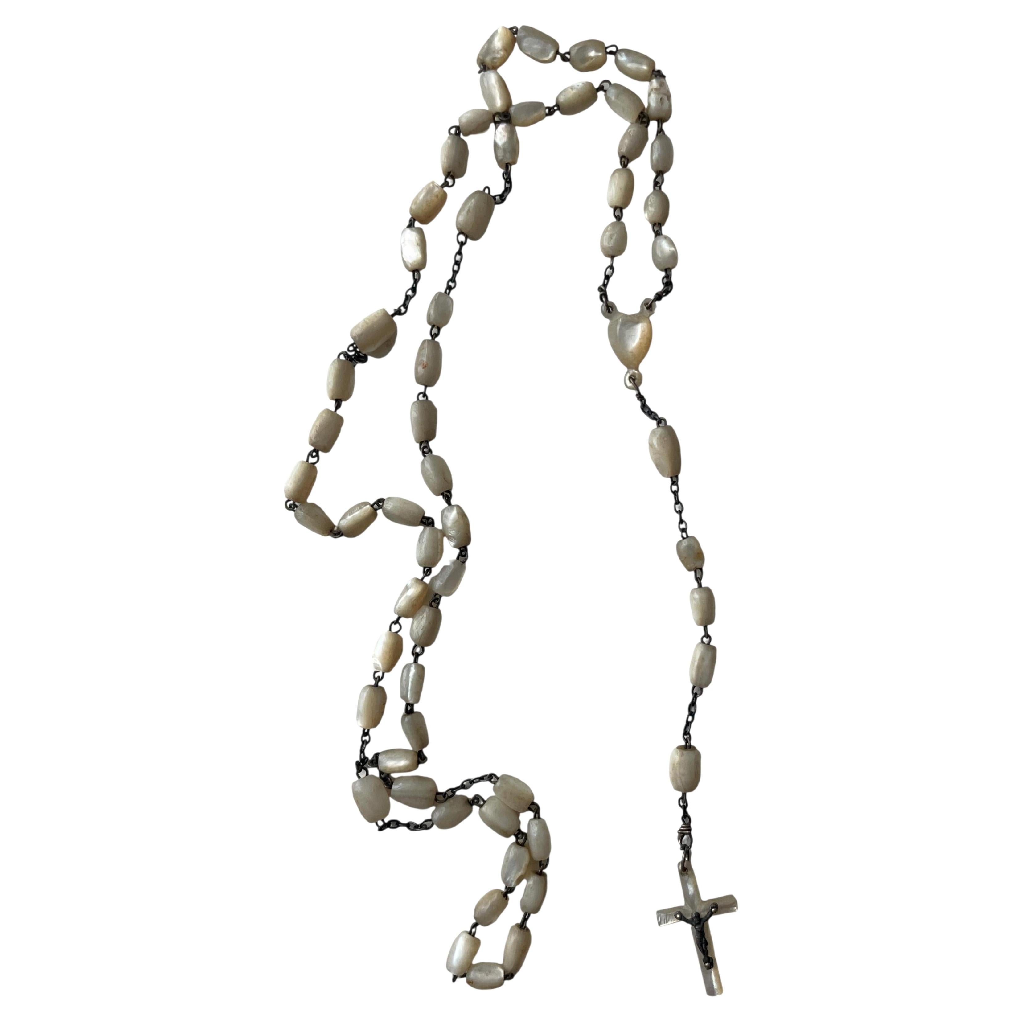 What do the beads on a rosary mean?