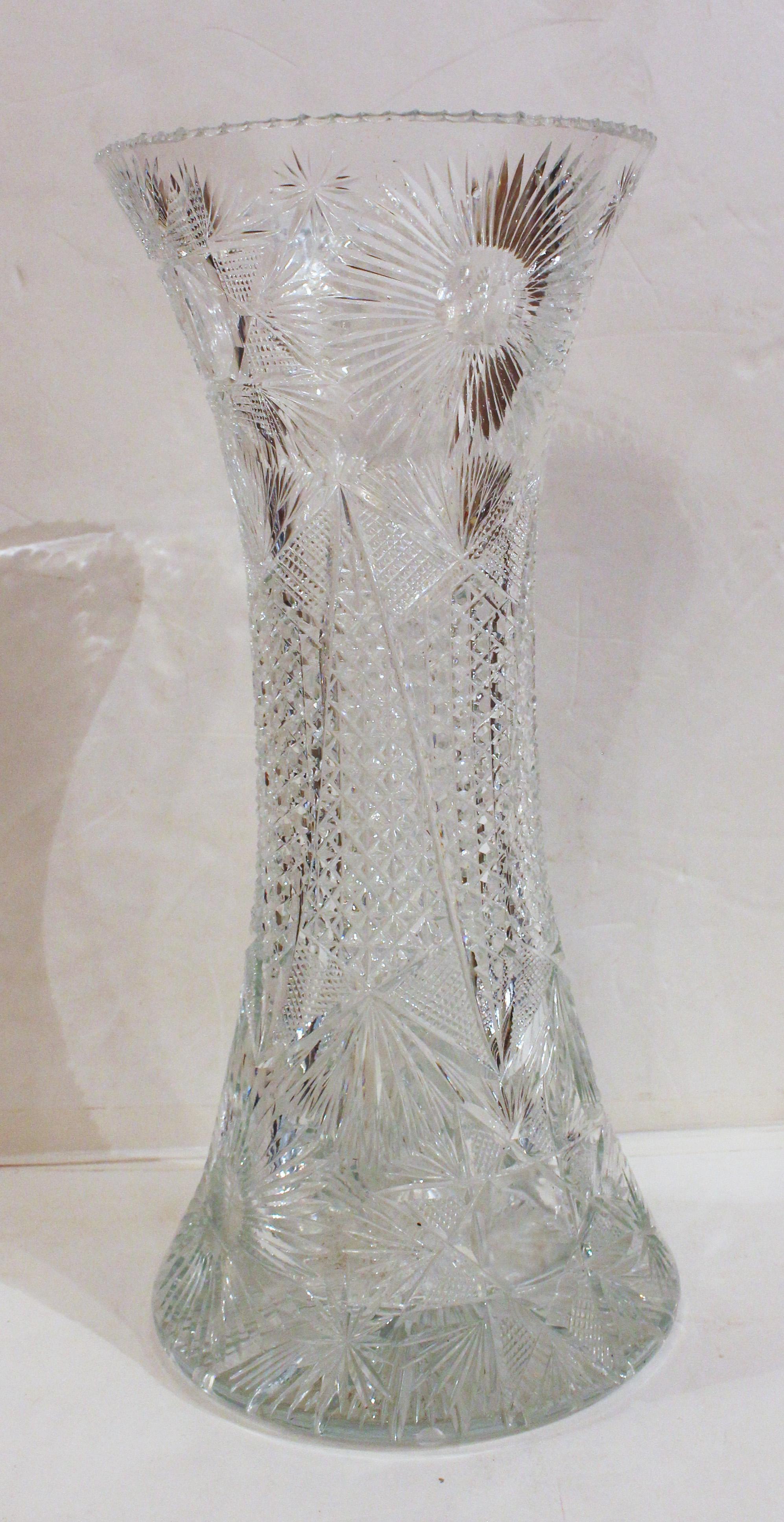 A monumental hand blown & cut glass vase, American brilliant period, c.1895. Spectacularly decorated with flowers, caned panels, diamond panels & star cut base. A few very minor nicks.
19.5