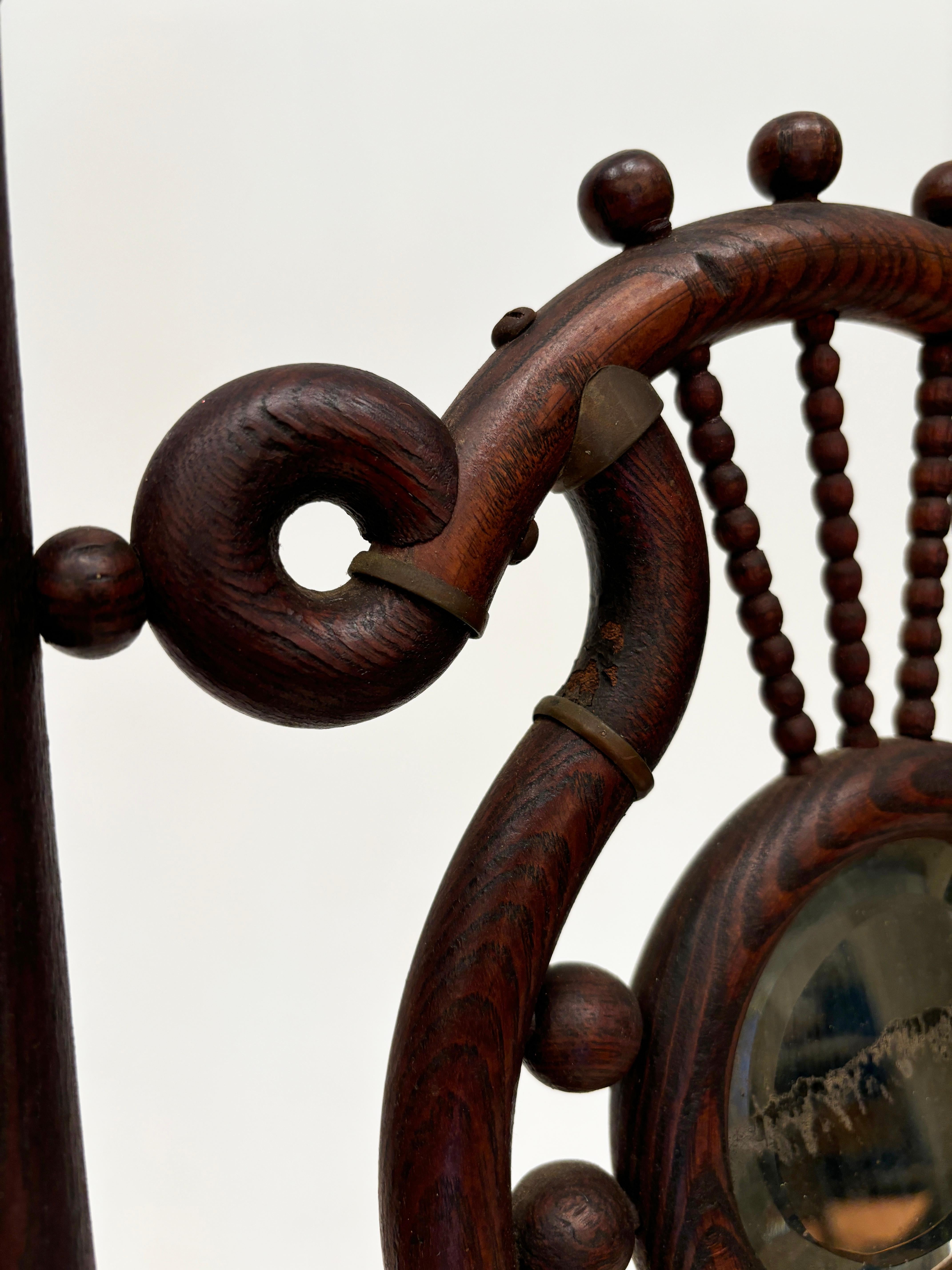 Chêne c. 1900 Victorian Oak Sticks and Ball Ornate Easel Stand en vente