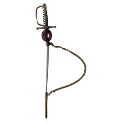 c. 1900s Edwardian Silvered Metal Sword Jabot Pin with Amethyst Paste