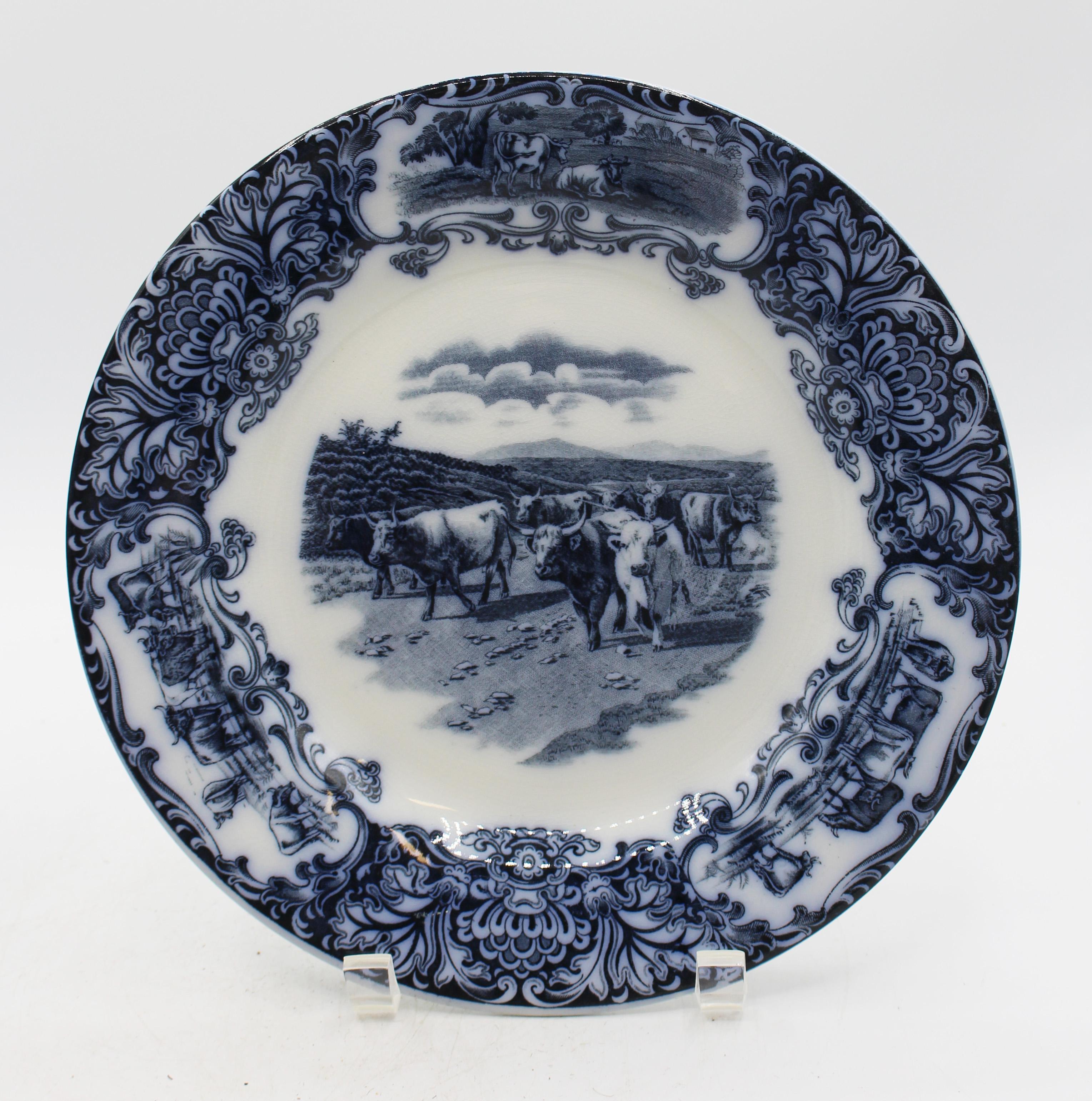 Circa 1908 Pair of Wedgwood Cows flow blue pattern plates, English. A reserve of Highlands Long Horn Cattle surrounded by 3 reserves of short horn cattle. Imperial porcelain mark. Good condition with a few light knife marks.
10