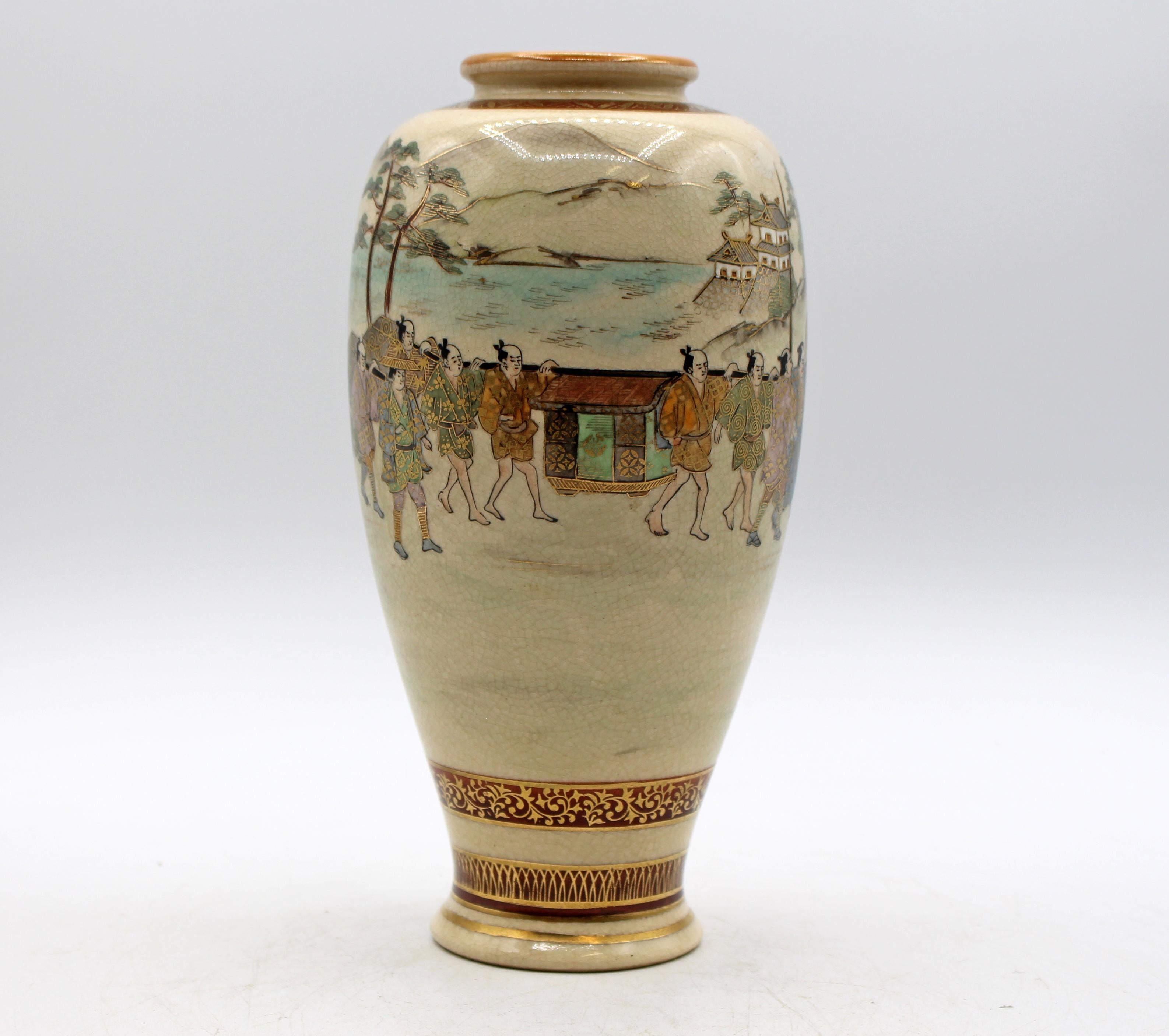 1912-1926 Satsuma Taisho period Vase by Kyokuzan workshop, Japan. Delicately painted processiona scene with lake & mountains in the background. Kyokuzan gilt mark on bottom. Burgundy ground gilt bordered & decorated bands are a nice, delicate