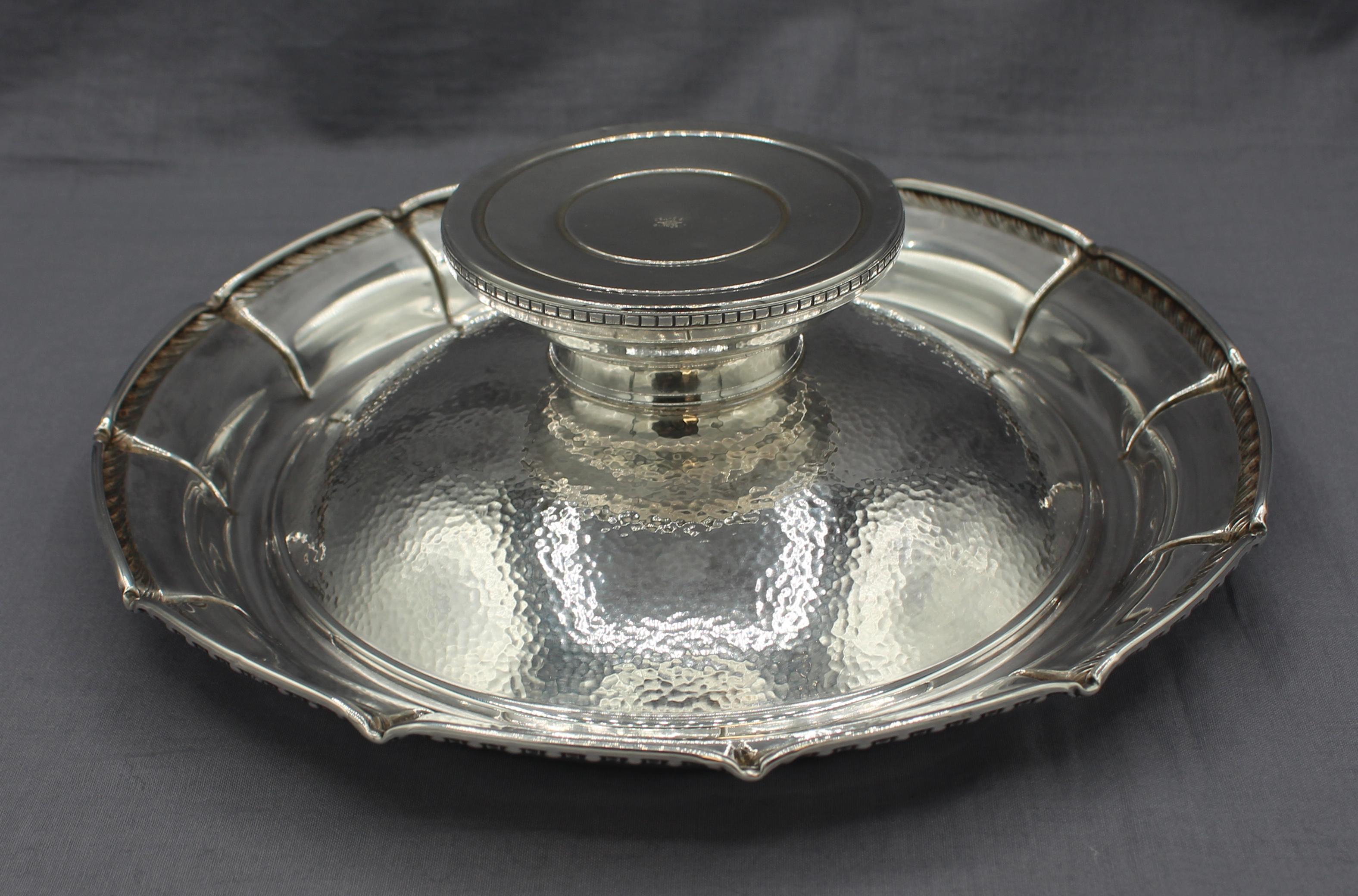 Hammered finish sterling silver large compote, c.1920-30s, by Webster. Lobed edge with gadroon border, a strikingly modern effect. Weighted base.
9.25