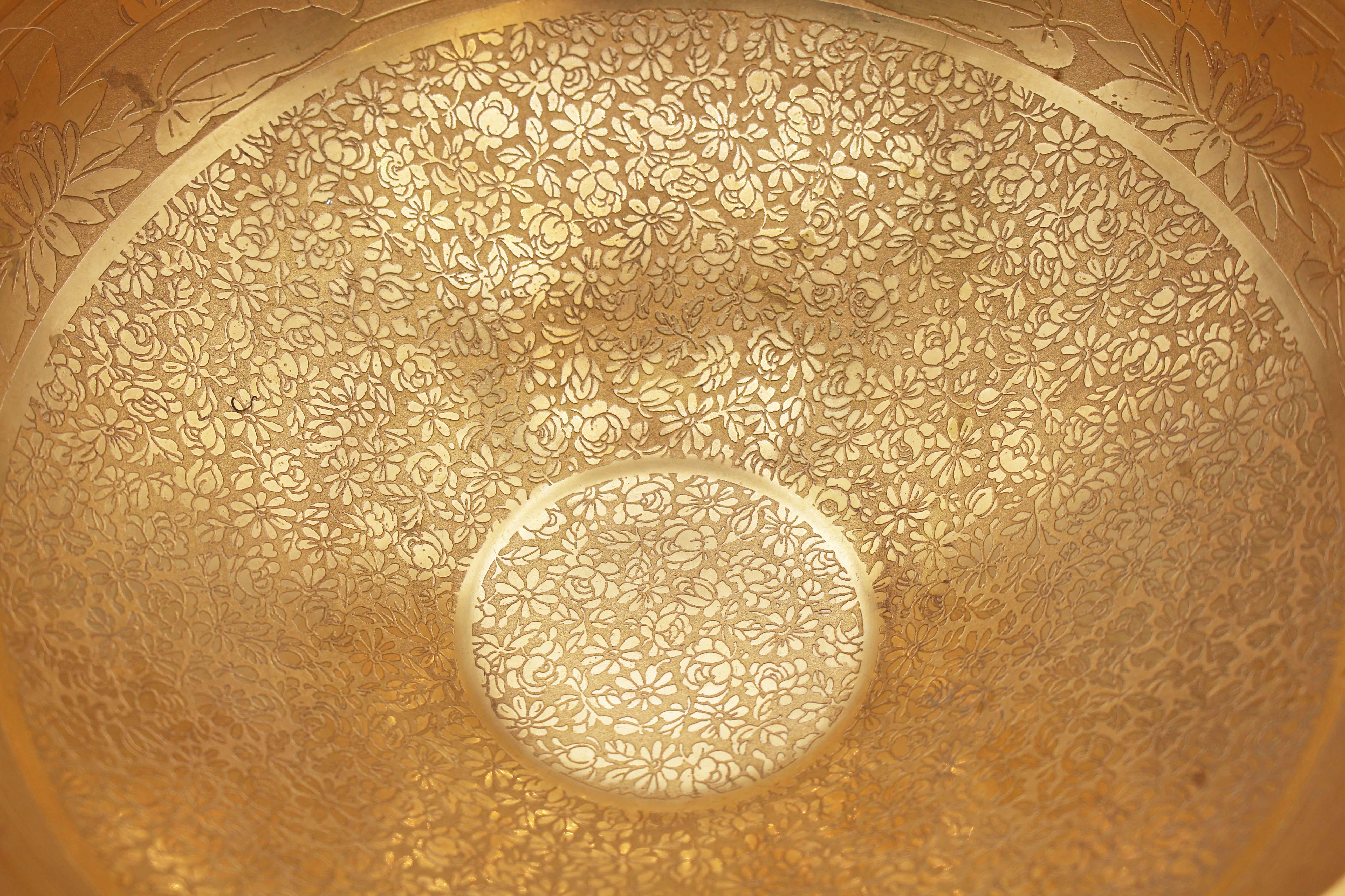 Art Deco, circa 1920s, gold encrusted porcelain fruit bowl, possibly a Pickard product. Engraved with an abundance of flowers & water lillies on the water. Double handled Classical form. Artist signed: Obome(?).
11.25