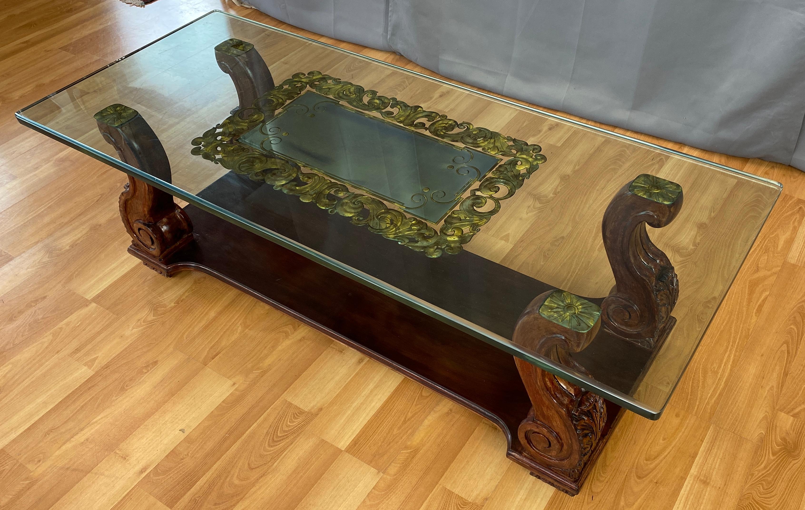 Offered here is a circa 1930s carved glass verre églomisé coffee table, created by Harriton Carved Glass in New York City.

The company created many works of art during their time of existence 1920s to early 1960s. From glass panels you'd find on a