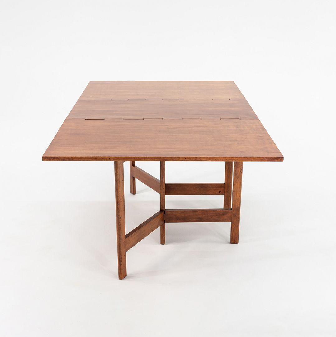 C. 1954 George Nelson para Herman Miller Mesa de comedor con patas en caoba mediados del siglo XX en venta
