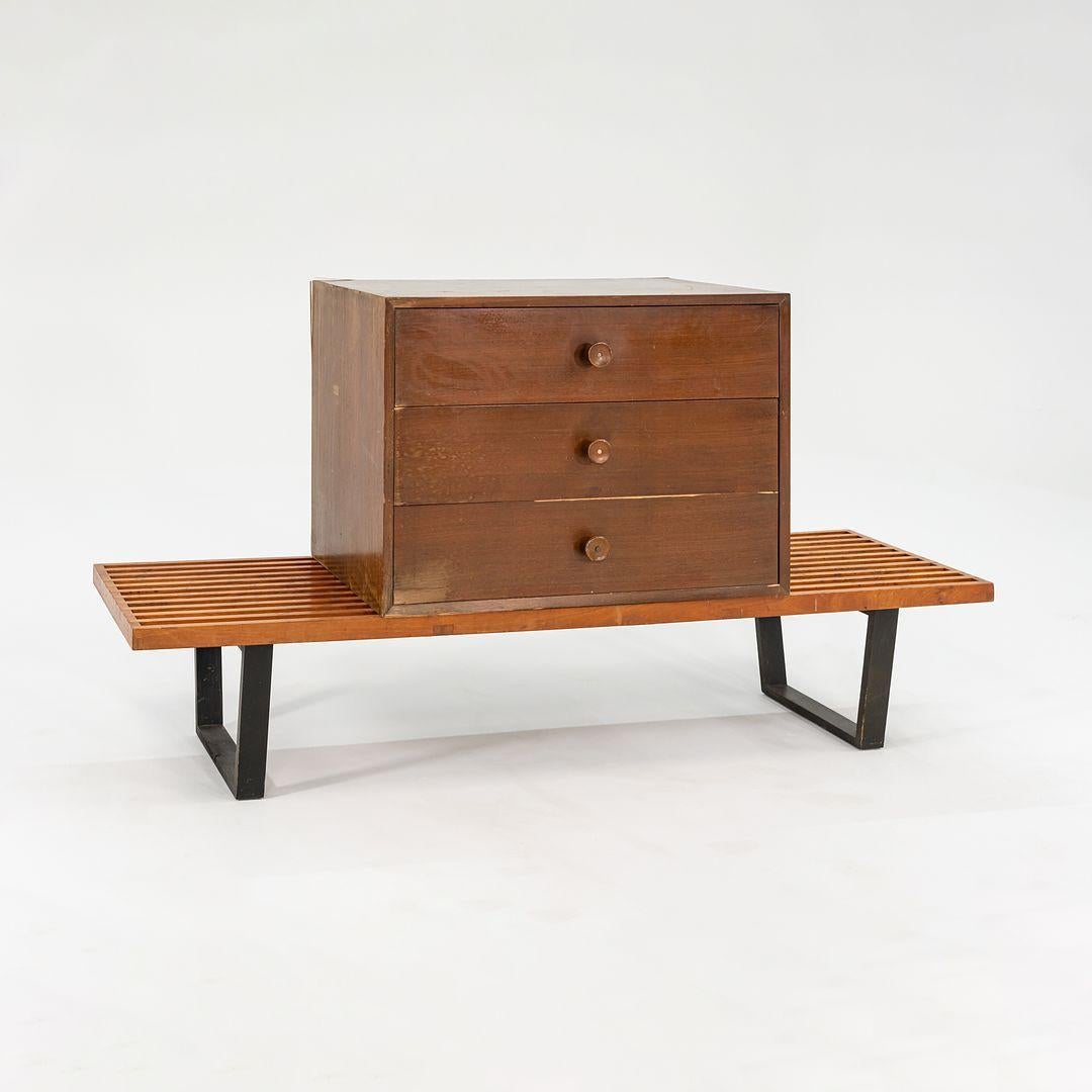 This is an uncommon Walnut Cabinet with three drawers, Model 4603, designed by George Nelson for Herman Miller in 1946. This design was part of George Nelson's Basic Cabinet Series. The listed price includes the cabinet itself but does not include