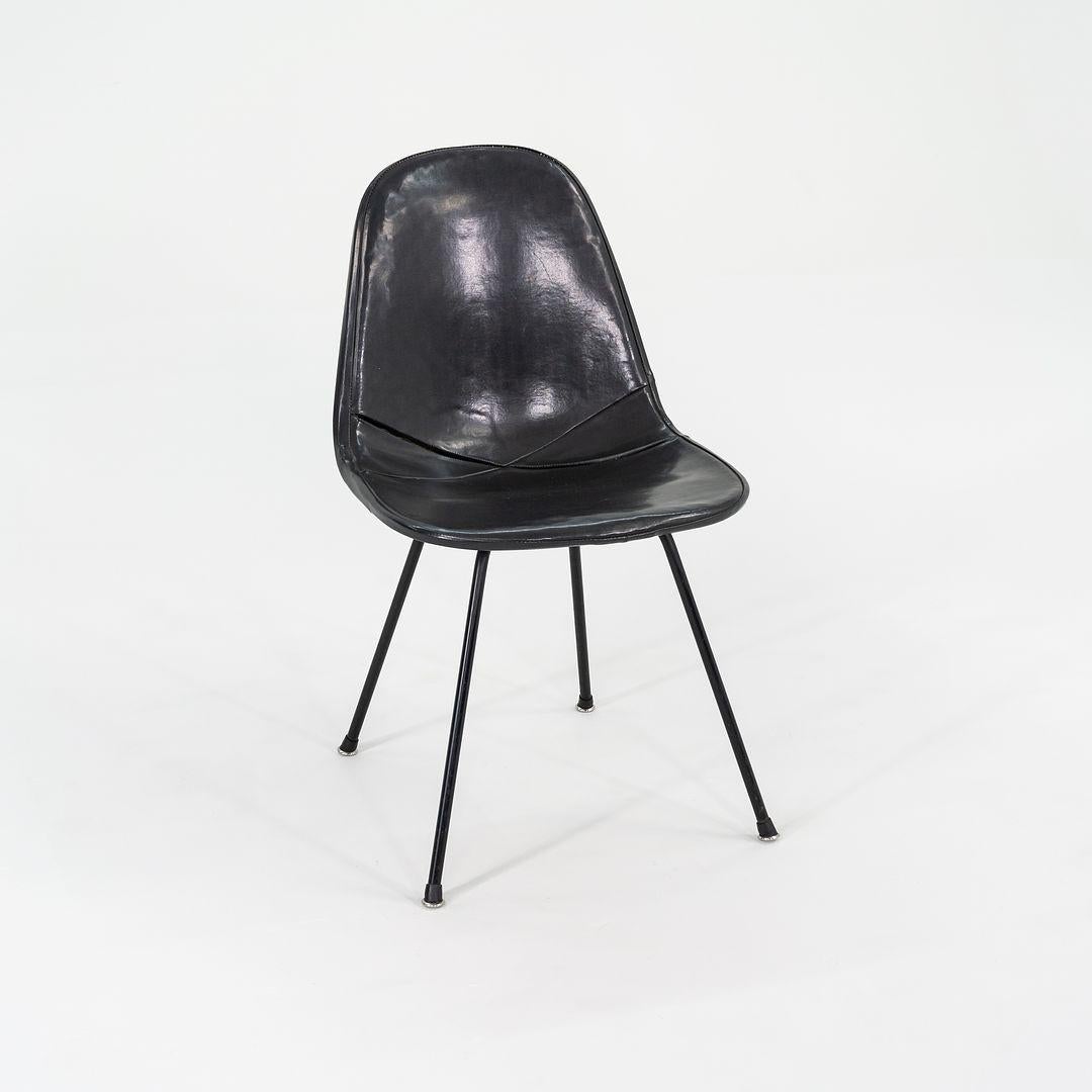 This is a set of four DKX chairs, originally designed by Ray and Charles Eames in 1951. These particular examples were produced by Herman Miller in the USA C. 1954. The chairs are comprised of a steel wire seat with foam that are upholstered in