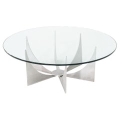 C. Mesa baja redonda de aluminio Donald Drumm de los años 60 con tapa de cristal