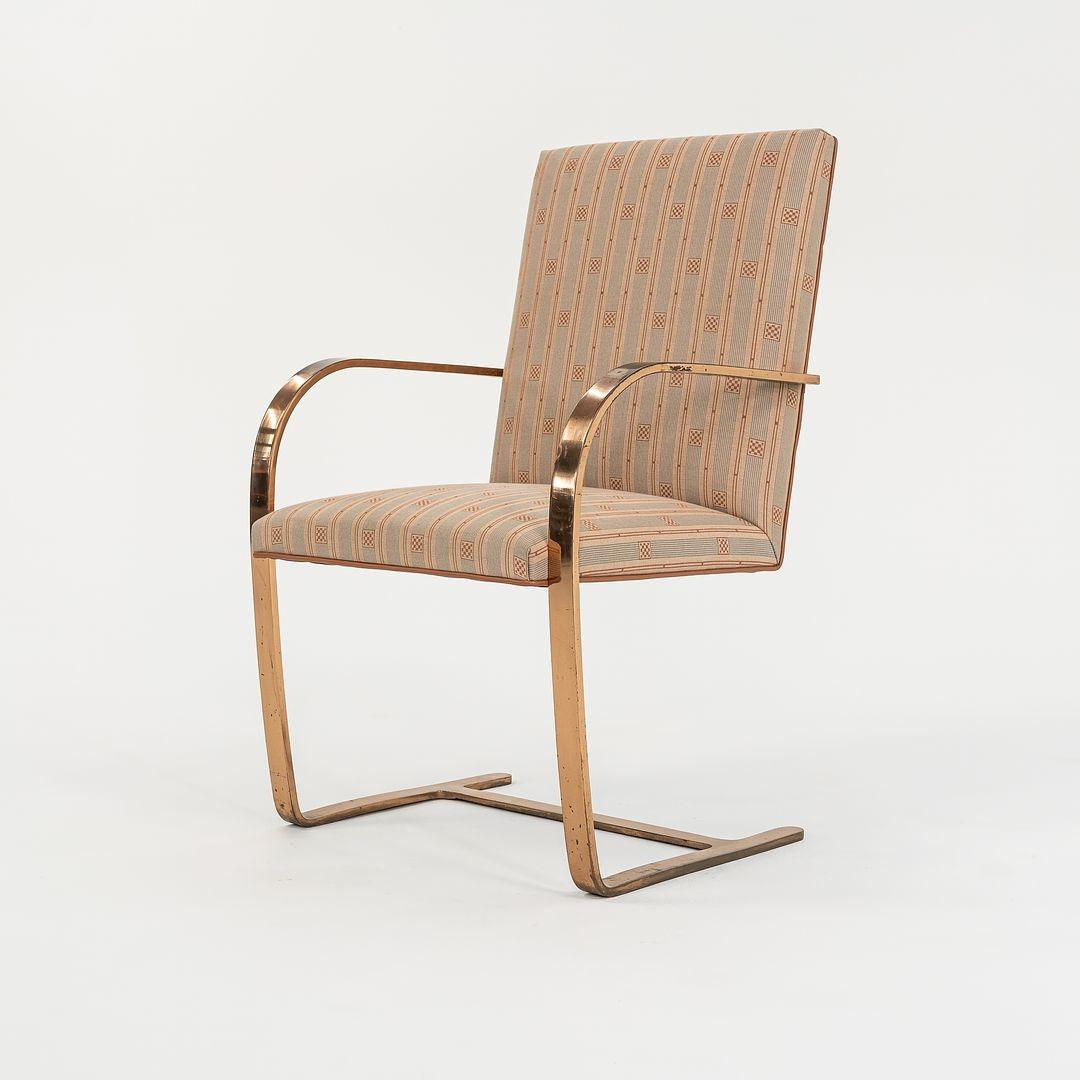 This is a rare Brno chair designed by Mies van der Rohe, produced circa 1960’s, with custom high back and also gold plated over actual bronze flat bar which is very unusual. Gratz Industries originally made many of these chairs for Knoll. This came