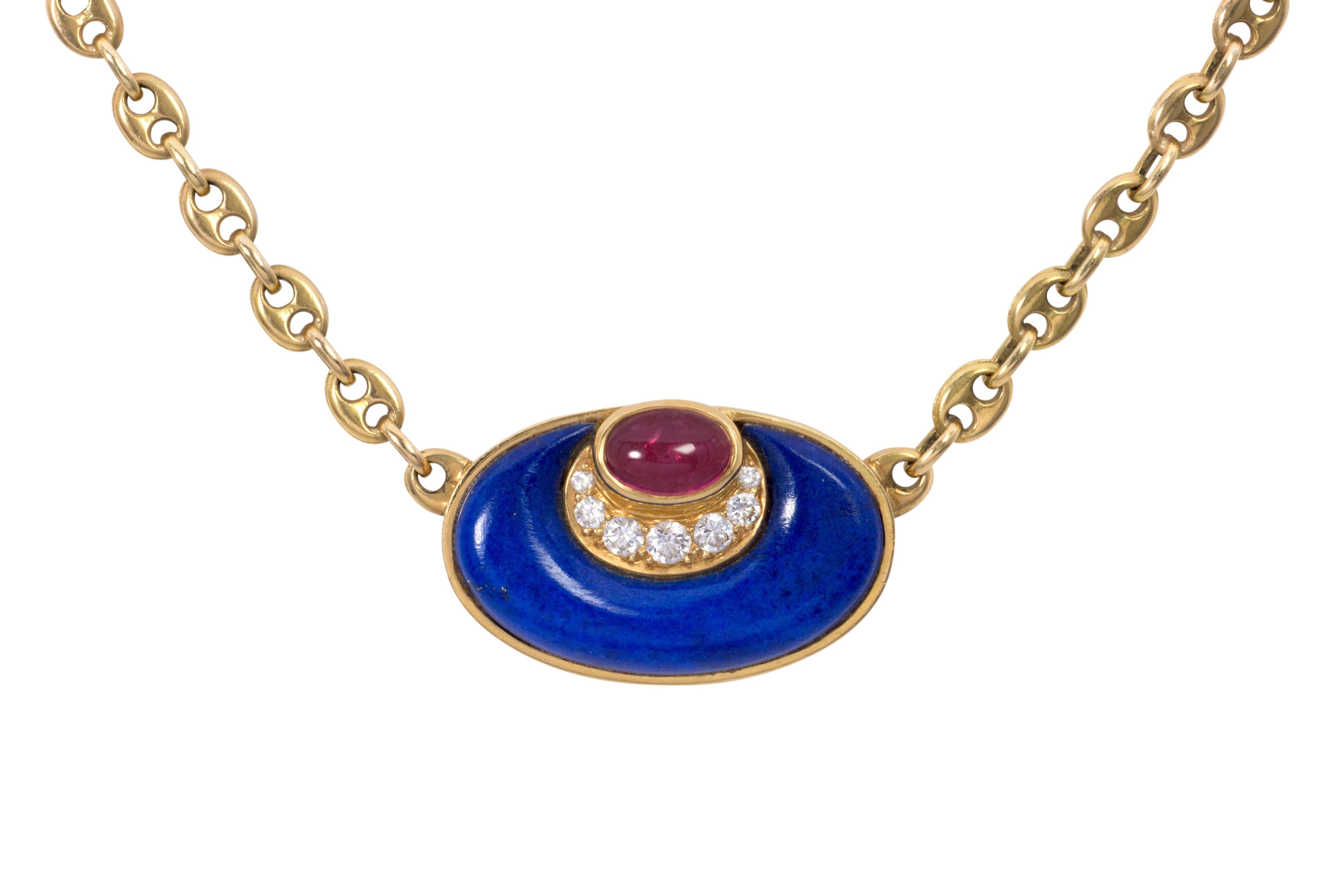 A lapis lazuli, cabochon pink tourmaline, diamond, 20 karat and 18 karat gold pendant necklace, by Bulgari, 1970s. Approximately 0.33 carats of round brilliant cut diamonds. 

Signed BVLGARI. Pendant stamped with maker's mark, 850. Chain stamped