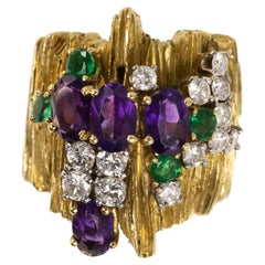 c. 1970 Henry Dunay Amethyst, Diamond, Emerald, and 18 Karat Gold Ring