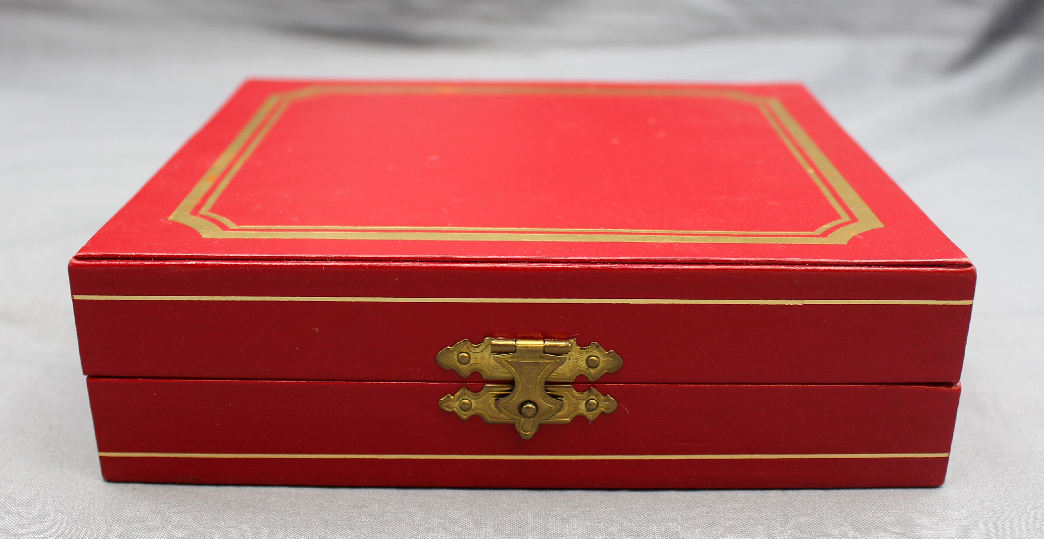 Circa 1970s boxed set of 4 Cartier sterling silver salt & pepper casters. The salts with gilded tops to prevent tarnish. Cartier scarlet case. 0.85 troy oz. 
Case: 6.5