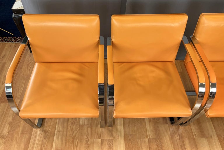 C. 1970s, Four Gordon International Flat Bar Brno Armchairs in Orange Leather In Good Condition For Sale In San Francisco, CA