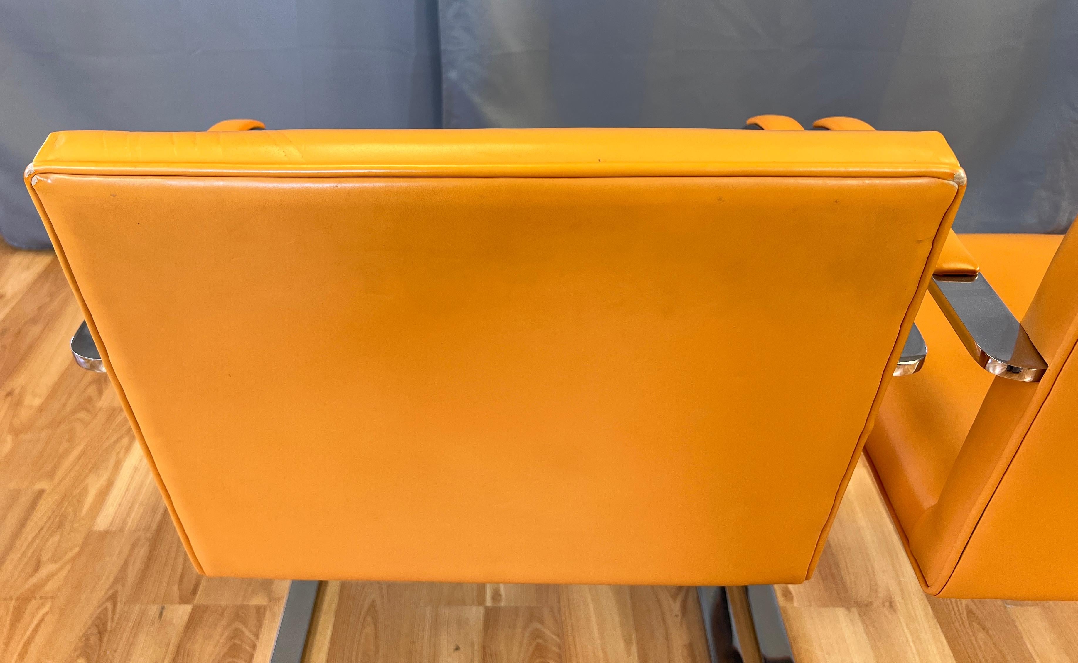 Two Gordon International Flat Bar Brno Armchairs in Orange Leather, circa 1970s 2