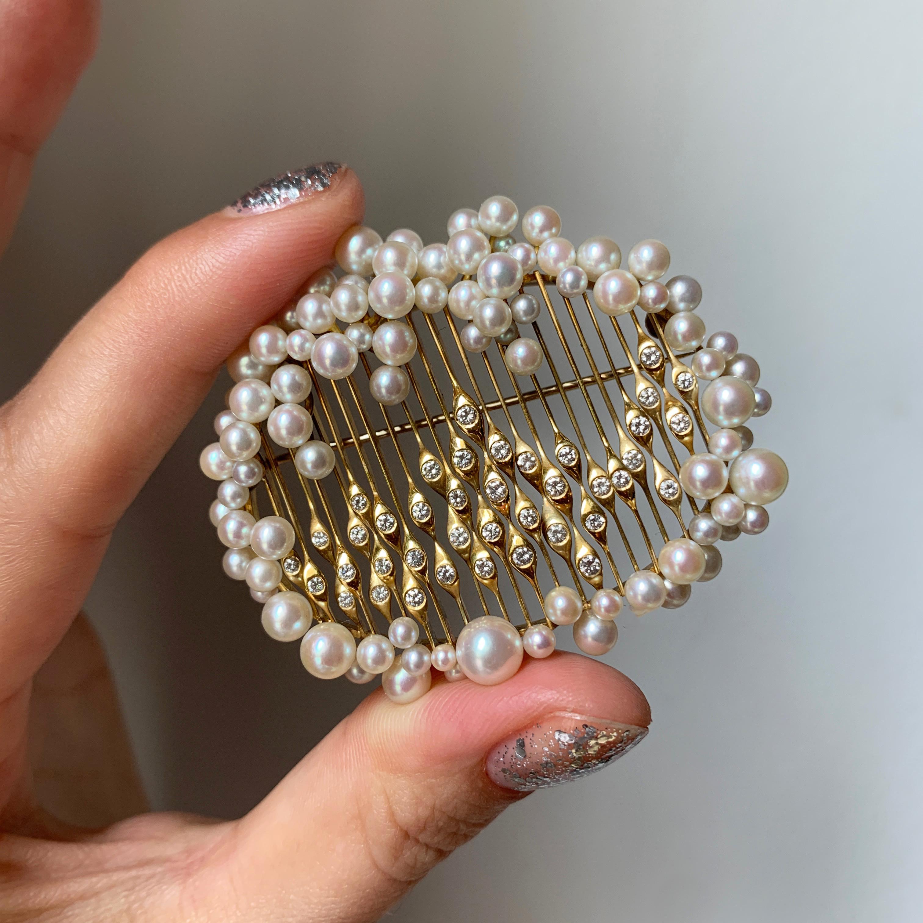 A pearl, diamond, and 18-karat gold brooch by Juwelier Weyersberg, c. 1974. Signed 