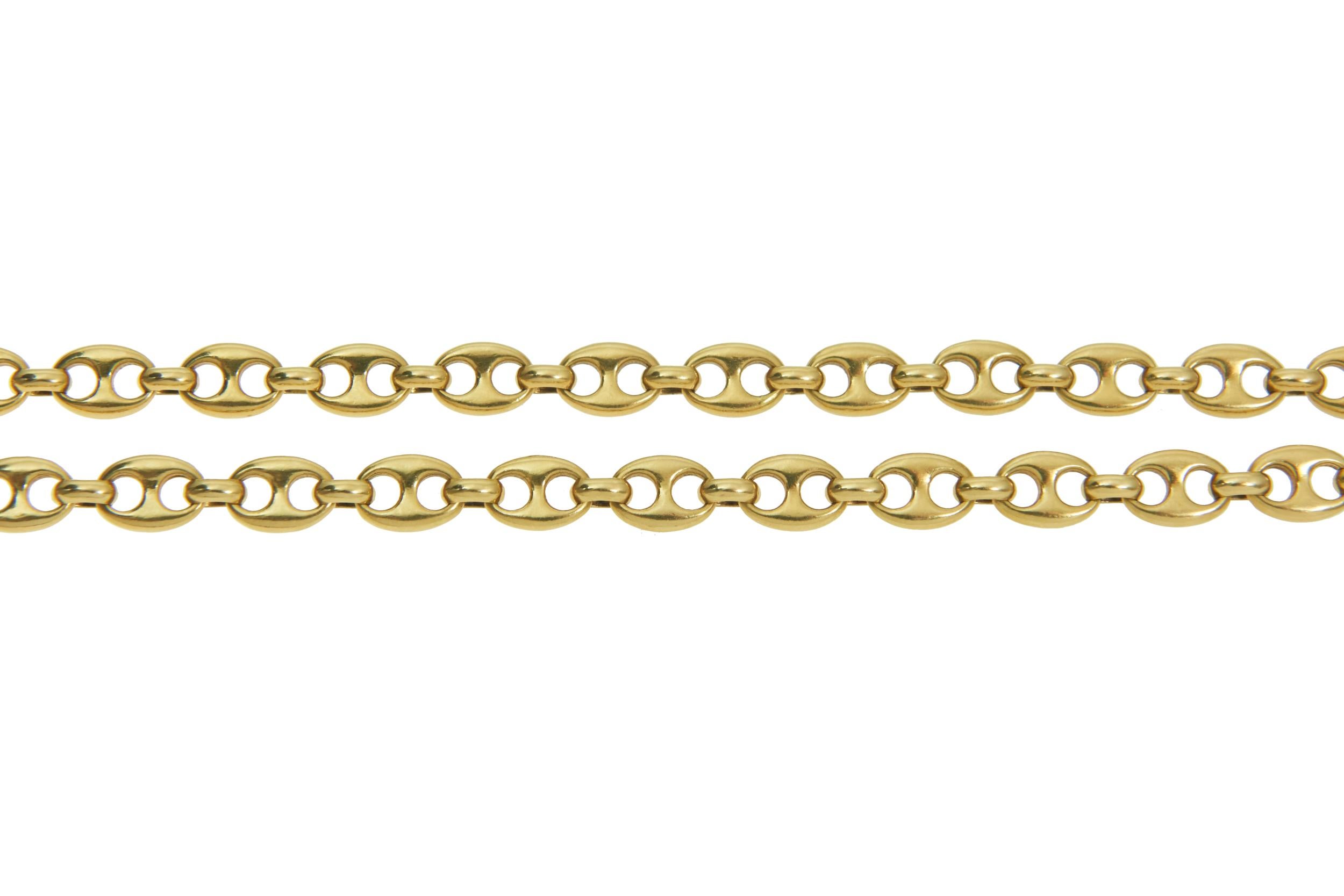 A long 18 karat gold Gucci-style anchor link chain, by Van Cleef & Arpels, c. 1975.

Chain measures 41