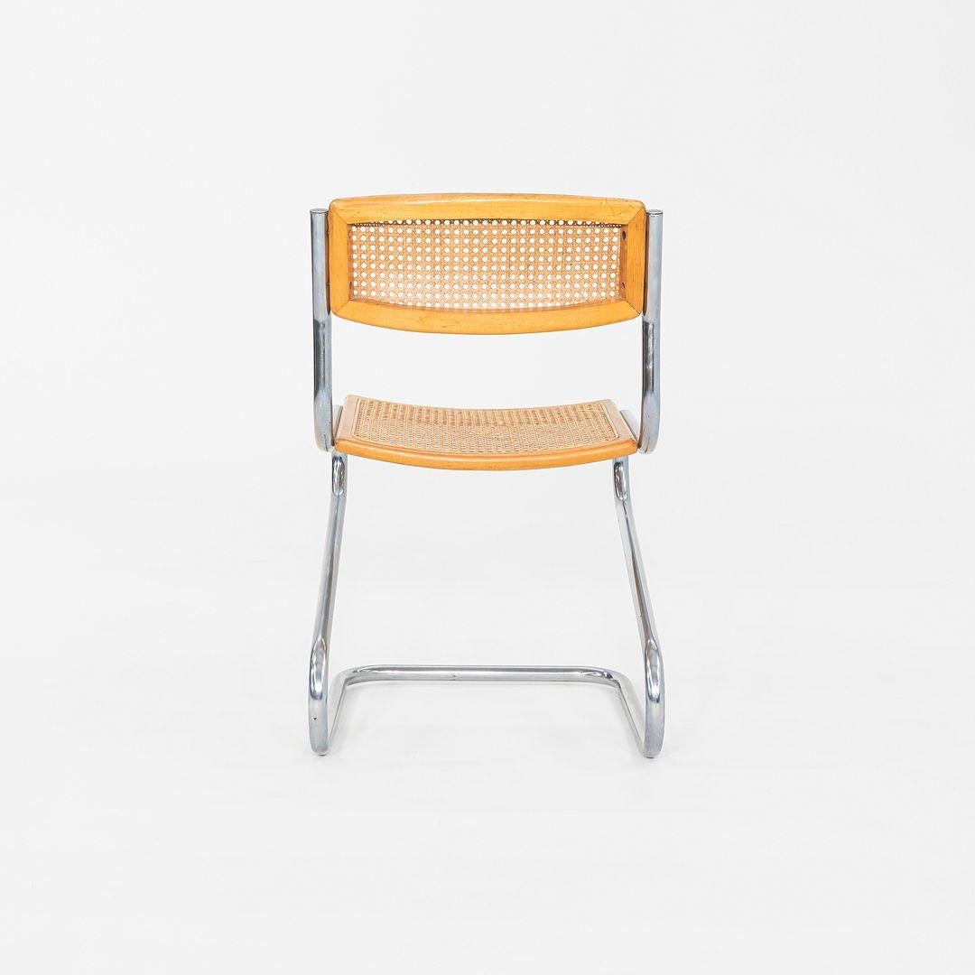 Fin du 20e siècle C. 1977 Chaise d'appoint italienne à piétement luge en acier chromé avec assise et dossier cannés en vente