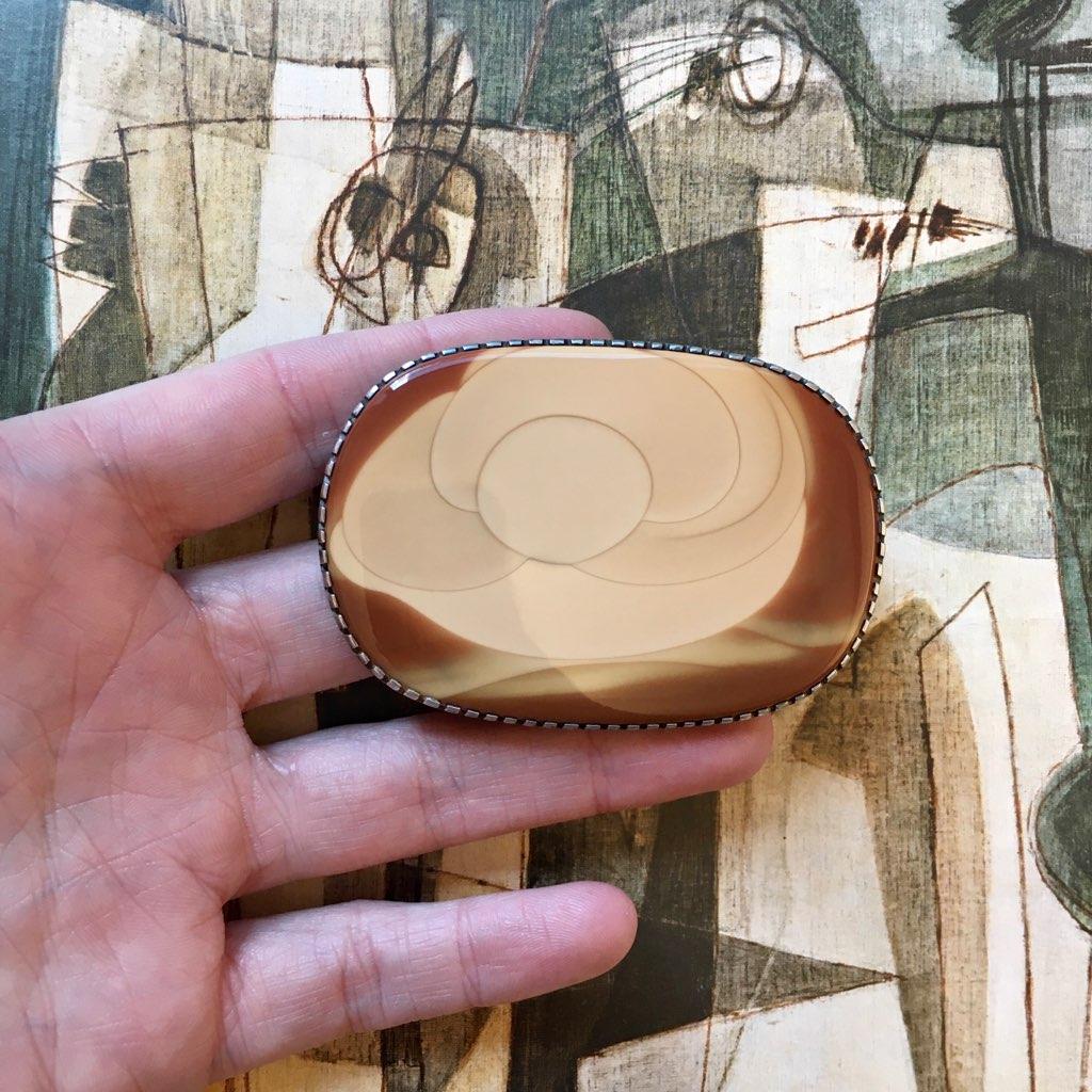 A large Bruneau jasper and sterling silver belt buckle, one-of-a-kind by Native American artists Gail Bird and Yazzie Johnson, c. 1980. Signed with maker's marks on reverse. 

Gail Bird (Santo Domingo/Laguna Pueblo, b. 1949) and Yazzie Johnson