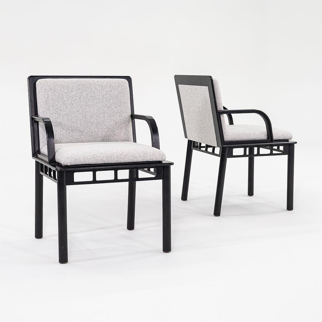 This is an original pair of ‚ÄòBridge‚Äô armchairs, designed by Ettore Sottsass for Knoll Studio in 1988. The listed price includes the pair. The chairs are formed of solid maple wood that has been ebonized, and have been freshly upholstered in a