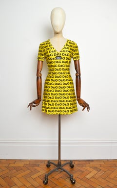 C. 1995 Dolce & Gabbana D&G Yellow Micro Mini Dress with Repeat Logos