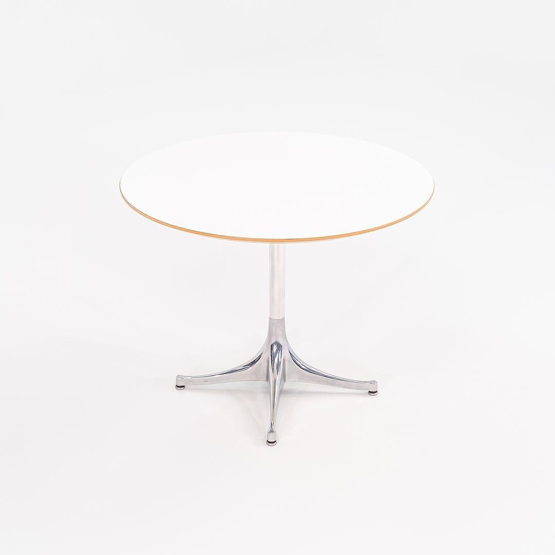 C. Tavolino con piedistallo in laminato bianco George Nelson for Herman Miller, anni 2000, 28